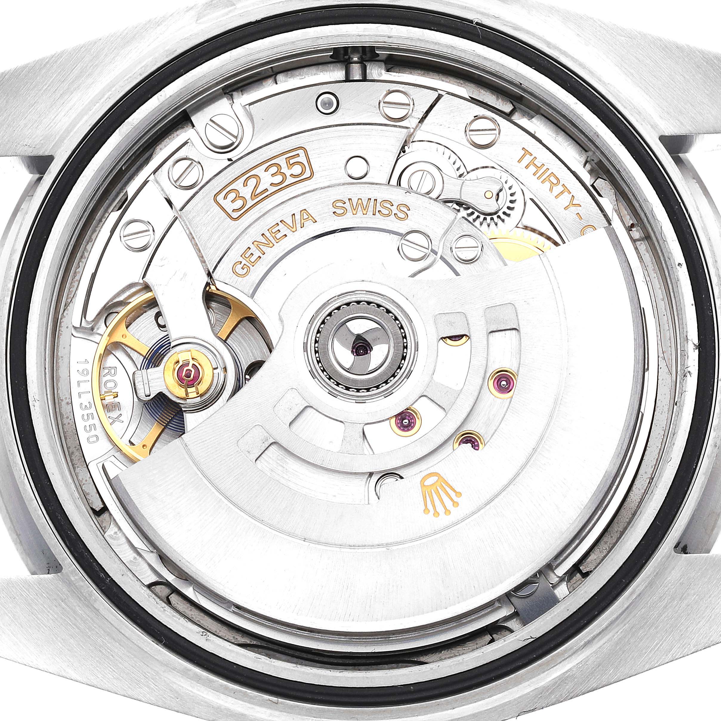 The image shows a close-up view of the movement inside the Rolex Datejust 41 126300 Men
s Stainless Steel Blue Dial 126300 Men
s Stainless Steel Blue Dial, featuring the caliber 3235.