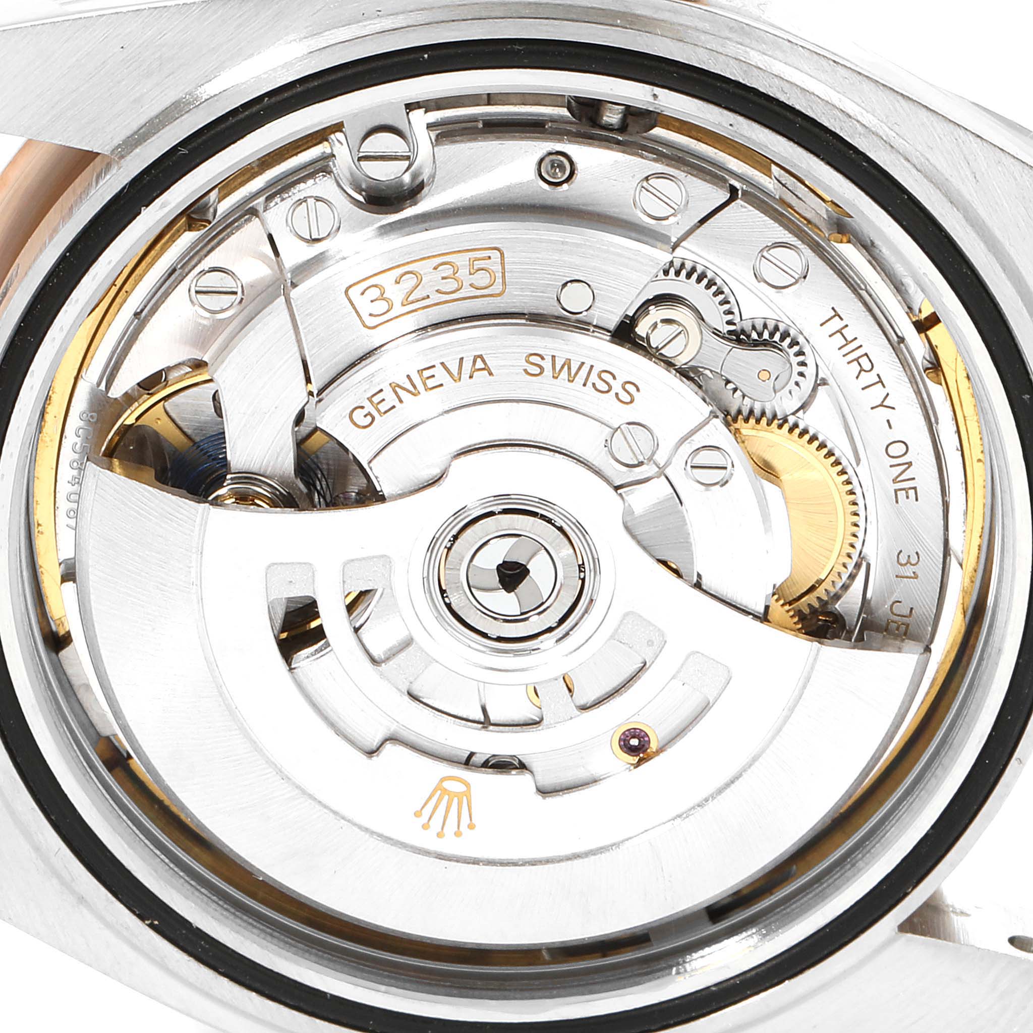 The image shows a close-up view of the movement and internal mechanism of a Rolex Datejust 41 126331 Men's Steel and Gold (two tone) Brown Dial 126331 Men's Steel and Gold (two tone) Brown Dial model.