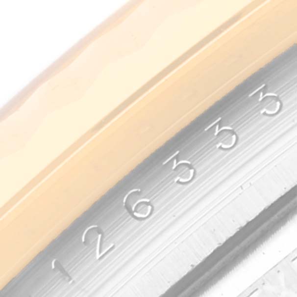 This close-up image features the bezel and part of the chapter ring on a Rolex Datejust 41 126333 Men's Steel and Gold (two tone) Black Dial 126333 Men's Steel and Gold (two tone) Black Dial watch.