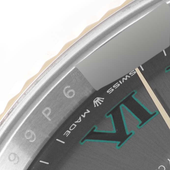 The image shows a close-up of the bezel and part of the dial of a Rolex Datejust 41 126333 Men's Steel and Gold (two tone) Grey Dial 126333 Men's Steel and Gold (two tone) Grey Dial watch.