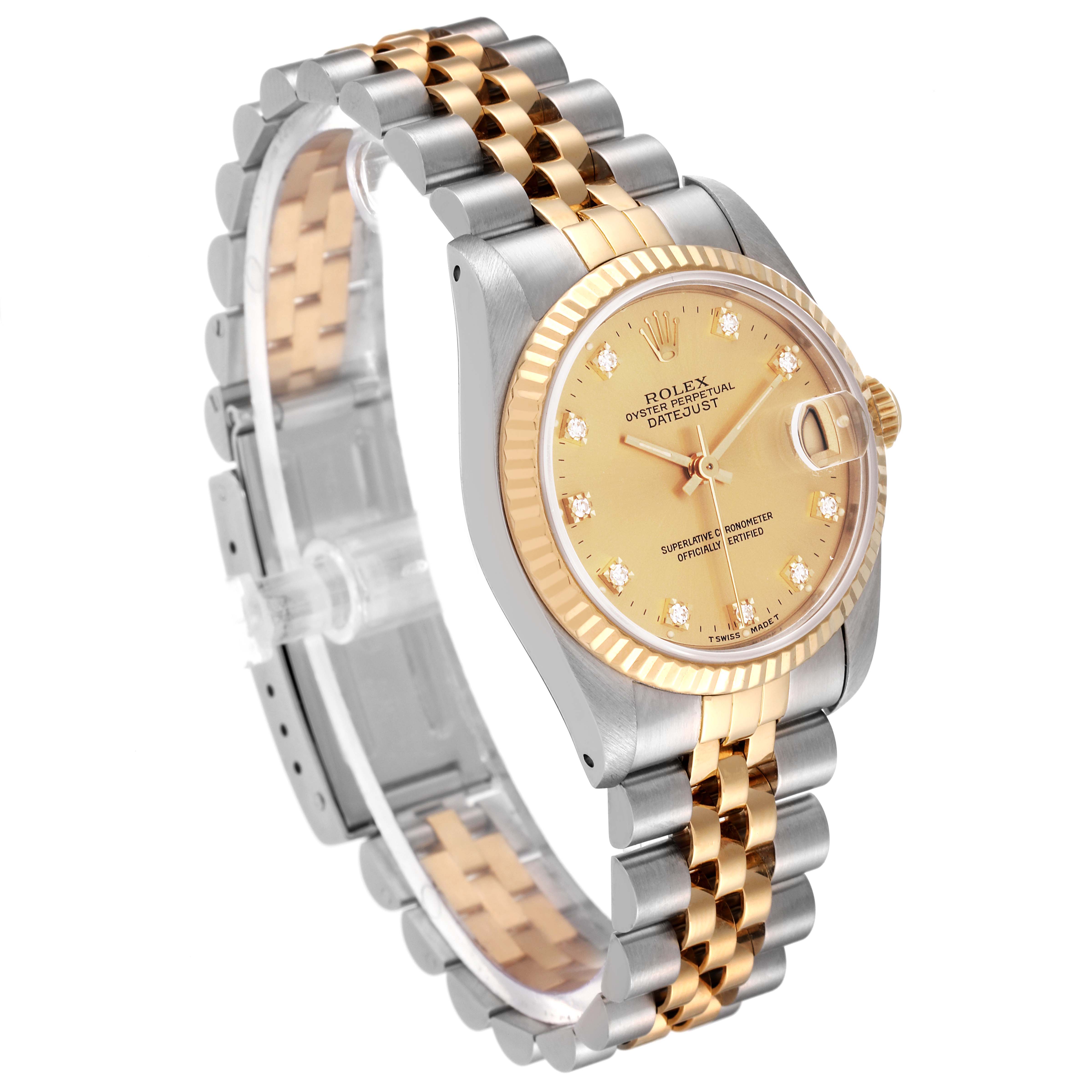 The image shows a three-quarters view of a Rolex Mid-Size 68273 Women
s Steel and Gold (two tone) Champagne Dial 68273 Women
s Steel and Gold (two tone) Champagne Dial Datejust watch displaying the dial, bezel, and two-tone bracelet.