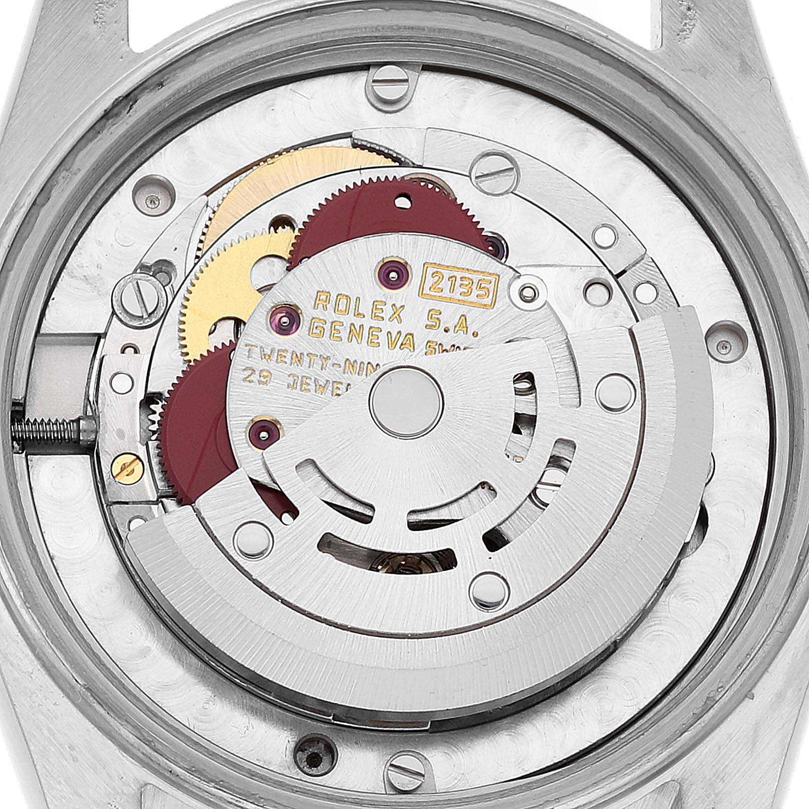 This image shows the internal movement mechanism of a Mid-Size Rolex watch from a close-up, top-down angle.