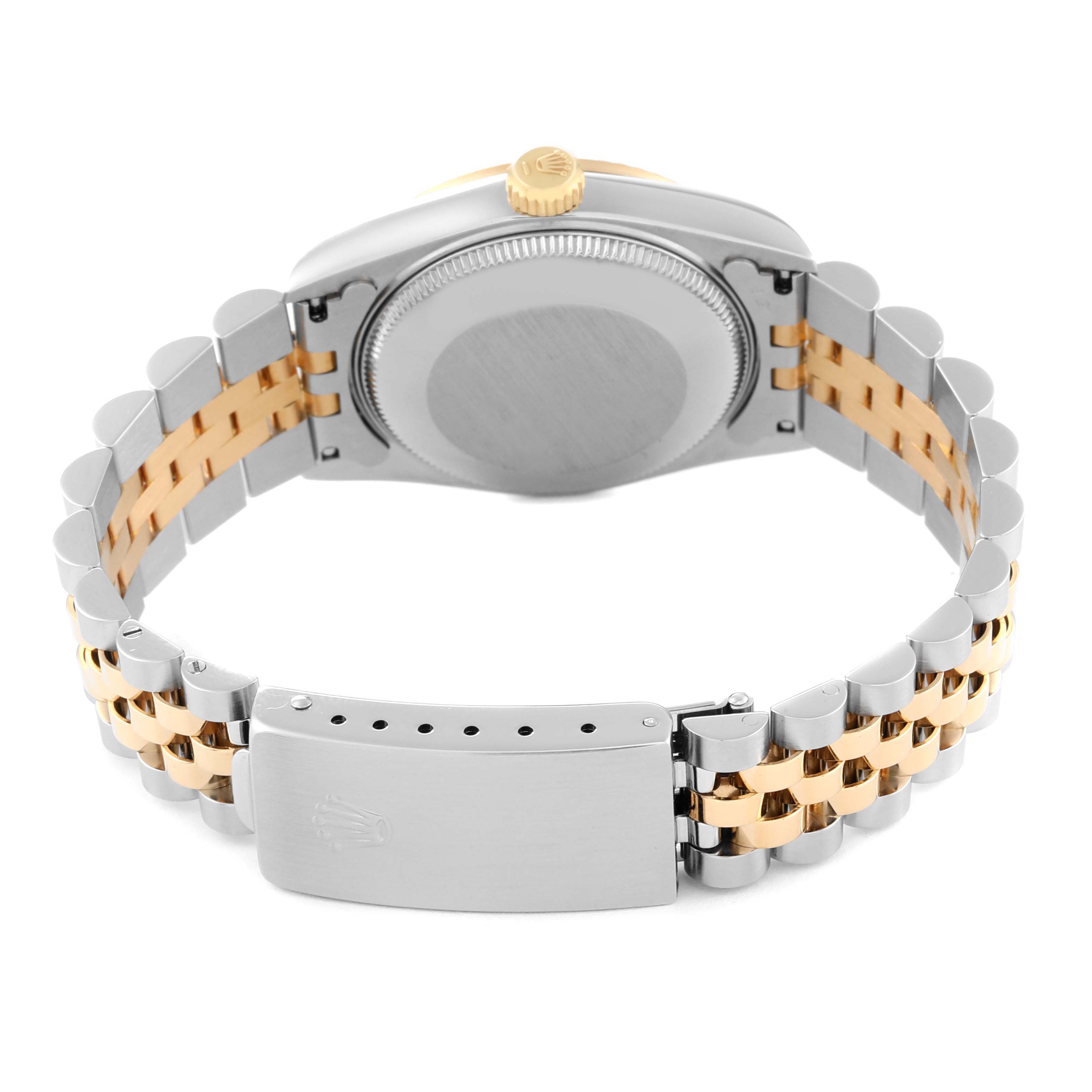 The image shows the back of a Rolex Mid-Size 68273 Women
s Steel and Gold (two tone) White Dial 68273 Women
s Steel and Gold (two tone) White Dial watch, focusing on the case back, crown, and jubilee bracelet with a clasp.