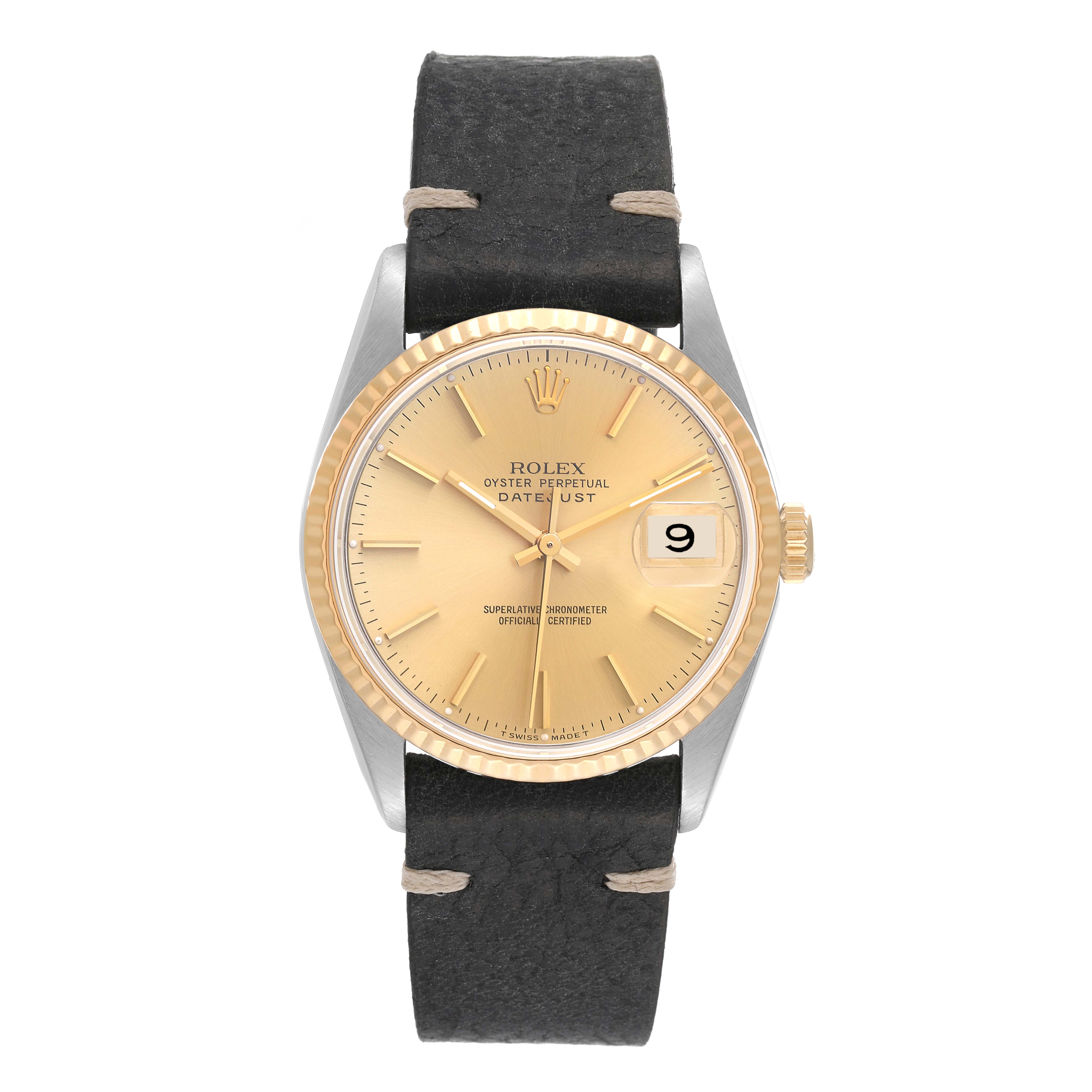 This is a frontal view of the Rolex Datejust 16233 Men's Steel and Gold (two tone) Champagne Dial 16233 Men's Steel and Gold (two tone) Champagne Dial watch, showing its dial, bezel, hands, and part of the leather strap.