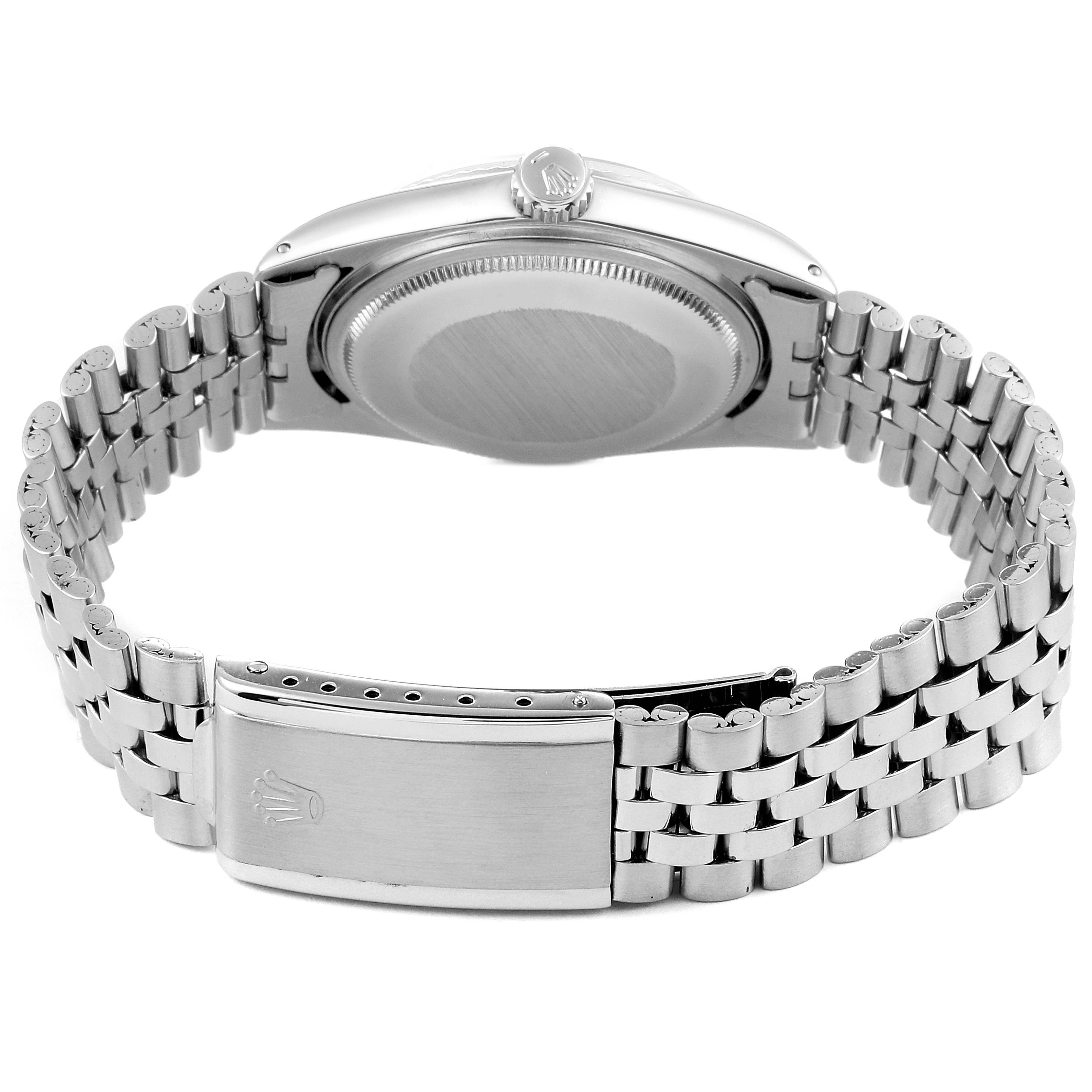 This image shows the back, clasp, and bracelet of a Rolex Vintage Collection 1601 Men's Stainless Steel Silver Dial 1601 Men's Stainless Steel Silver Dial model watch.