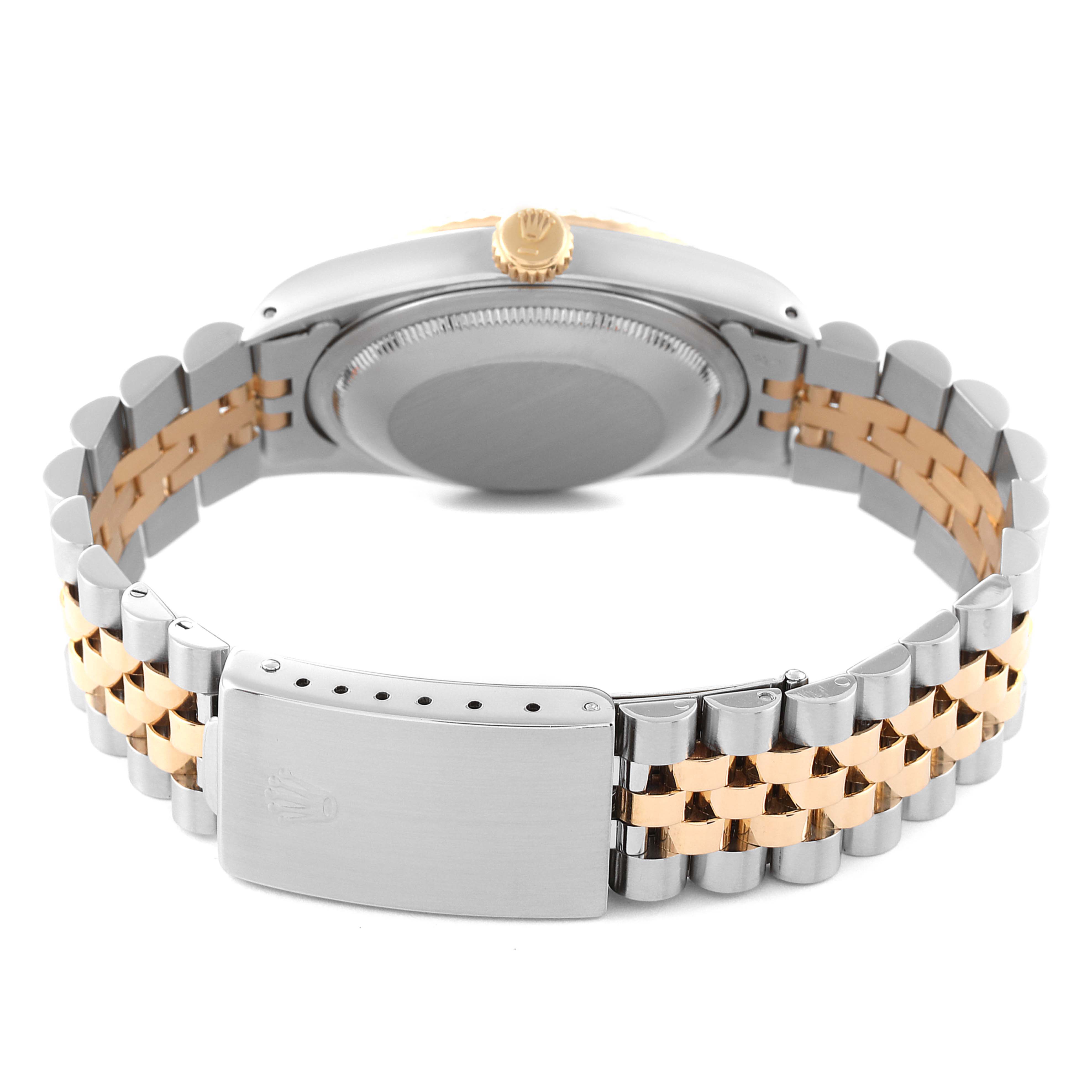 The image shows the back view of a Rolex Datejust 16233 Men's Steel and Gold (two tone) Black Dial 16233 Men's Steel and Gold (two tone) Black Dial watch, focusing on the case back, crown, and two-tone bracelet.