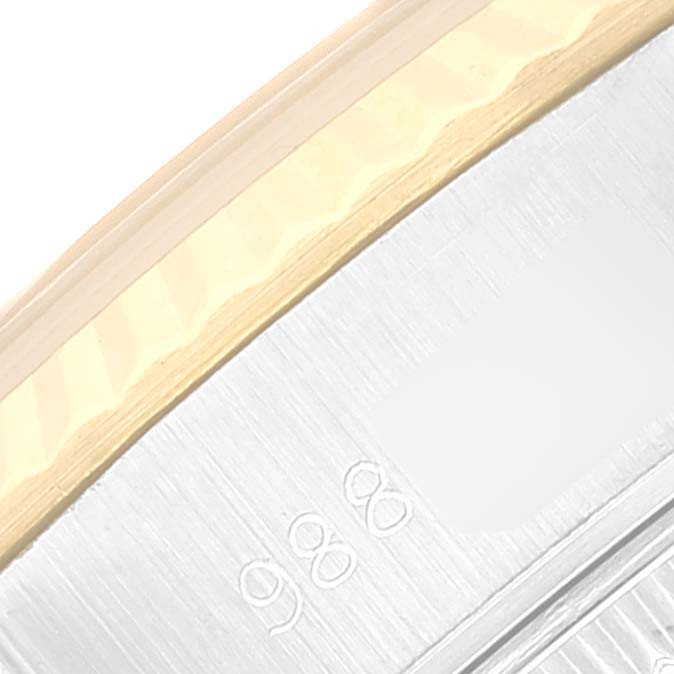 This close-up image shows part of the band and clasp of a Rolex Datejust 69173 Women's Steel and Gold (two tone) Champagne Dial 69173 Women's Steel and Gold (two tone) Champagne Dial watch.