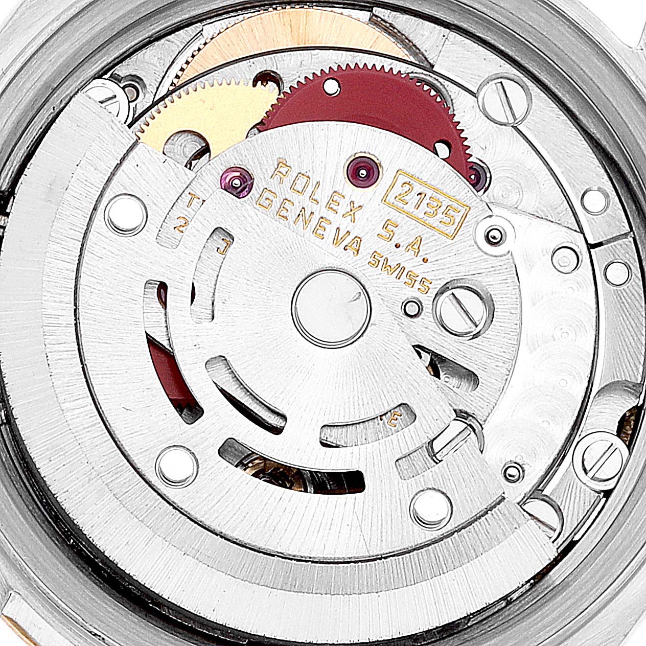 This is a close-up view of the internal mechanism of a Rolex Datejust 69173 Women's Steel and Gold (two tone) Champagne Dial 69173 Women's Steel and Gold (two tone) Champagne Dial watch, showing its gears and rotor.