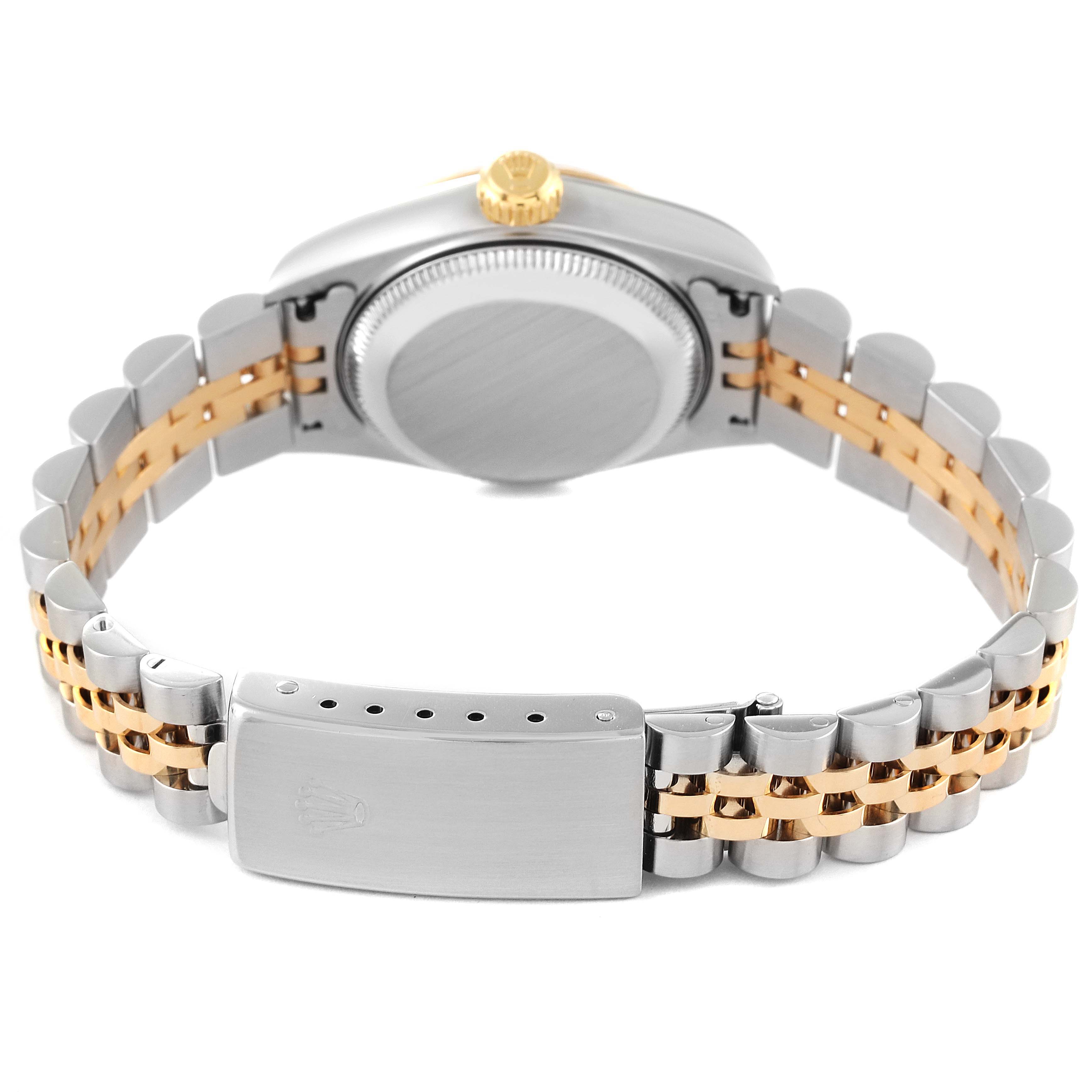 The image shows the back view of a Rolex Datejust 79173 Women's Steel and Gold (two tone) Champagne Dial 79173 Women's Steel and Gold (two tone) Champagne Dial watch, highlighting its case, bracelet, and clasp.