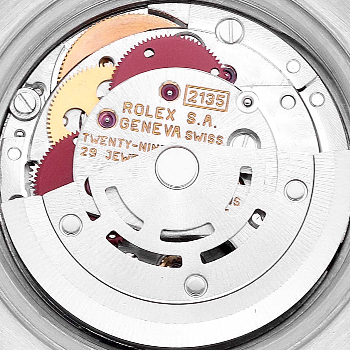 This image shows the internal mechanism of a Rolex Datejust 69173 Women's Steel and Gold (two tone) Champagne Dial 69173 Women's Steel and Gold (two tone) Champagne Dial watch, focusing on the movement and gears.