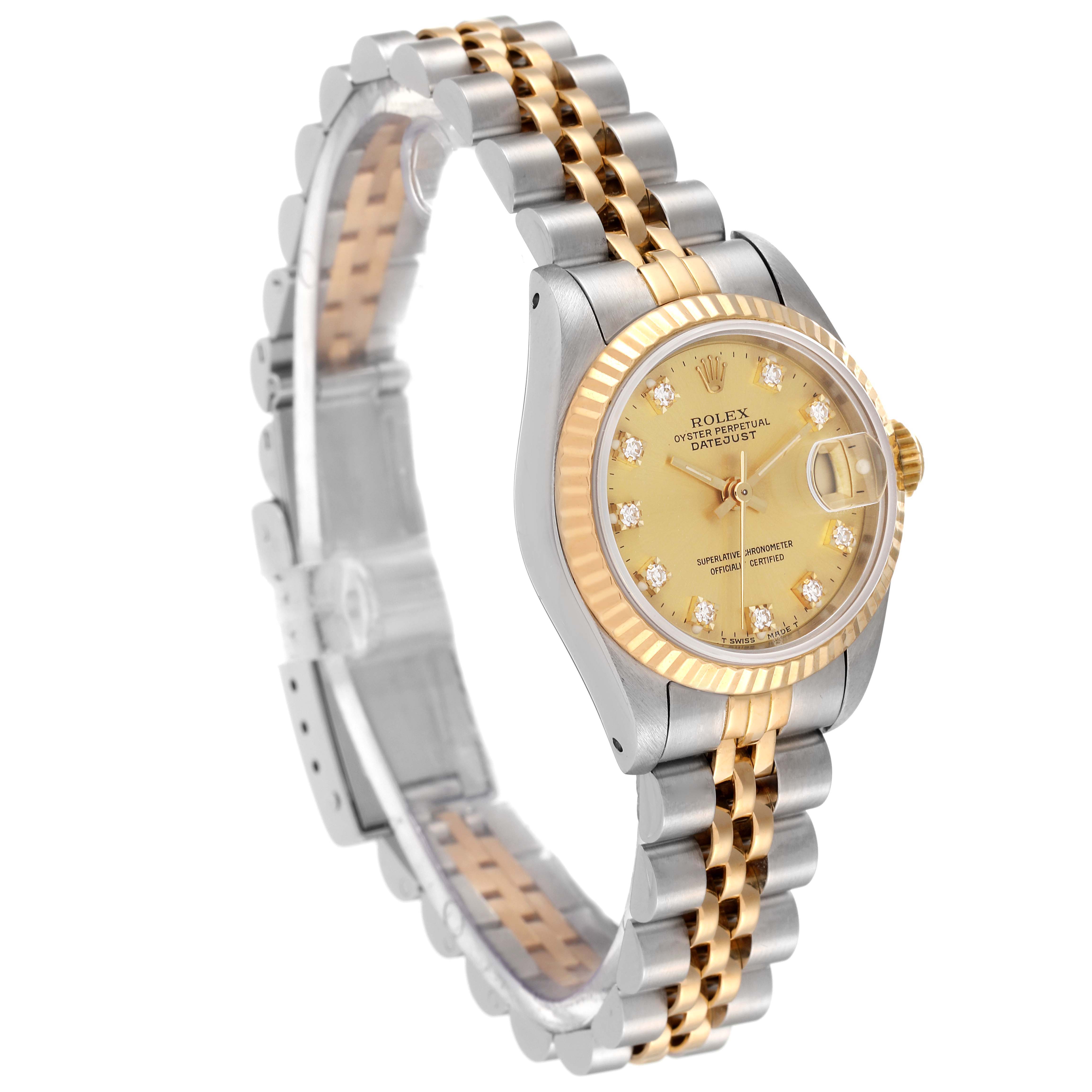 The Rolex Datejust 69173 Women's Steel and Gold (two tone) Champagne Dial 69173 Women's Steel and Gold (two tone) Champagne Dial watch is shown in a three-quarter angle, highlighting its two-tone bracelet, champagne dial, and fluted bezel.