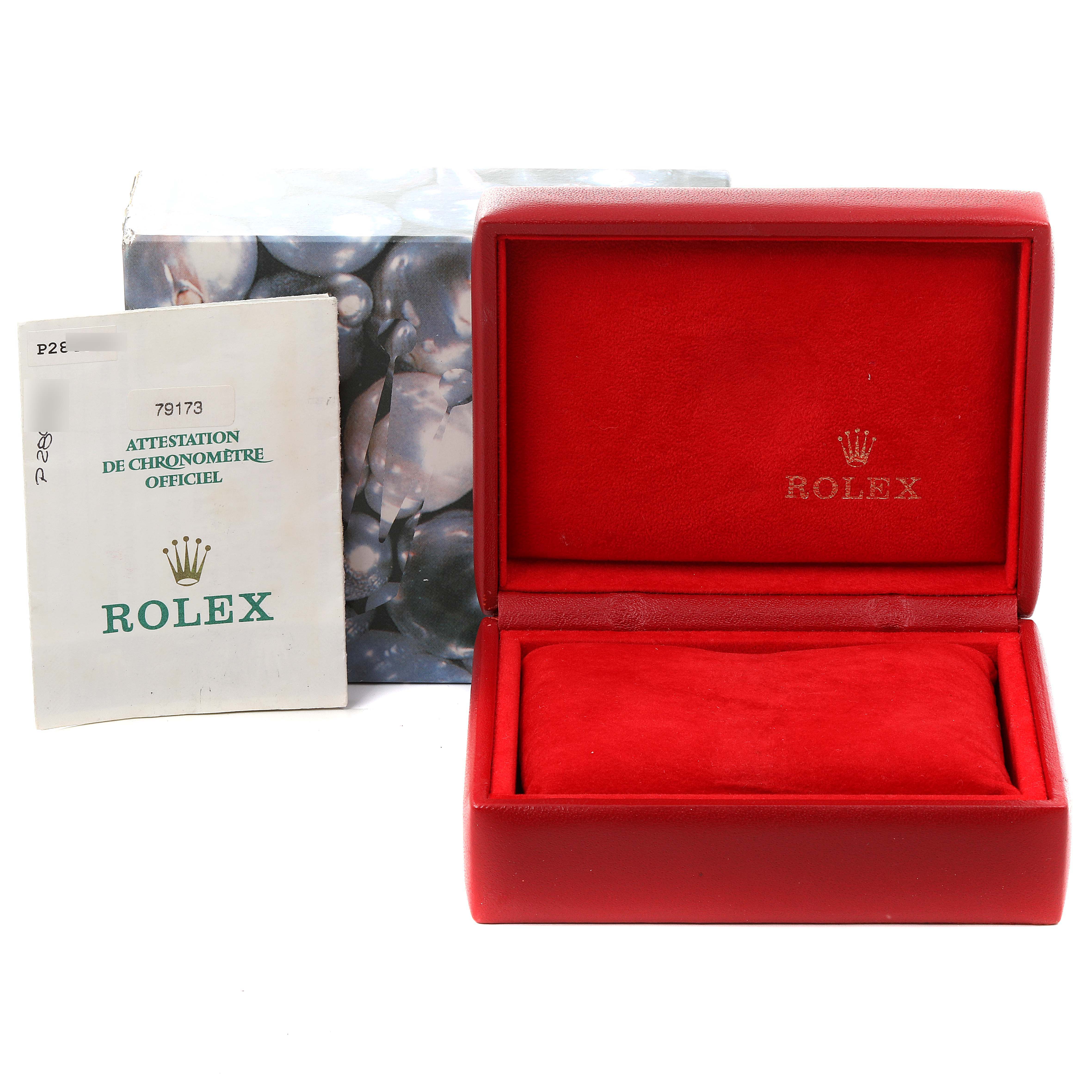 The image shows a red Rolex Datejust 79173 Women's Steel and Gold (two tone) Black Dial 79173 Women's Steel and Gold (two tone) Black Dial watch box, an outer box, and an official Rolex chronometer certification.