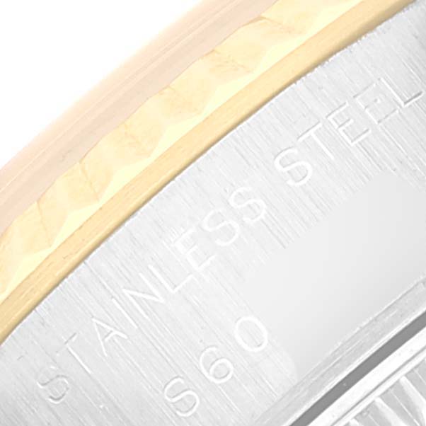 The image shows a close-up of the stainless steel case and partial gold fluted bezel of a Rolex Datejust 69173 Women's Steel and Gold (two tone) White Dial 69173 Women's Steel and Gold (two tone) White Dial watch.