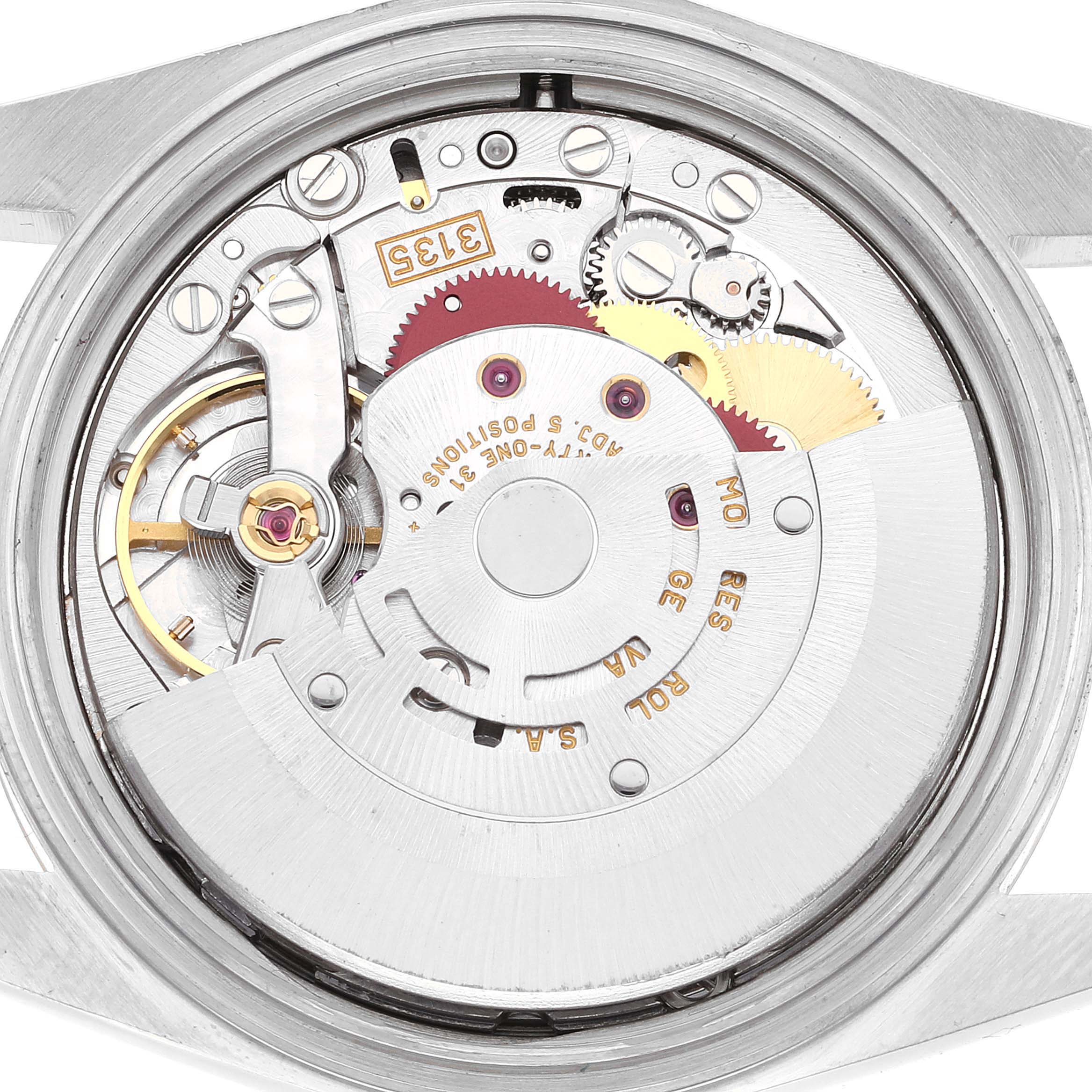 The image shows the inner mechanical movement of a Rolex Datejust 16233 Men's Steel and Gold (two tone) White Dial 16233 Men's Steel and Gold (two tone) White Dial watch, viewed from the back with various gears and components visible.
