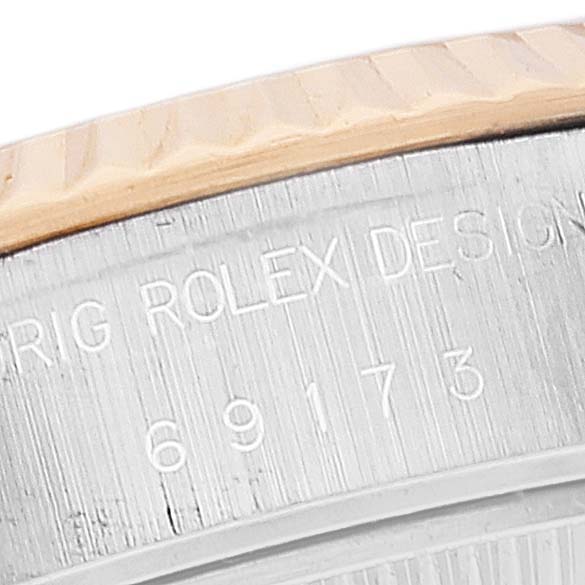 This image shows a close-up angle of the Rolex Datejust 69173 Women's Steel and Gold (two tone) White Dial 69173 Women's Steel and Gold (two tone) White Dial watch case, highlighting the engraved model number "69173" and part of the bezel.