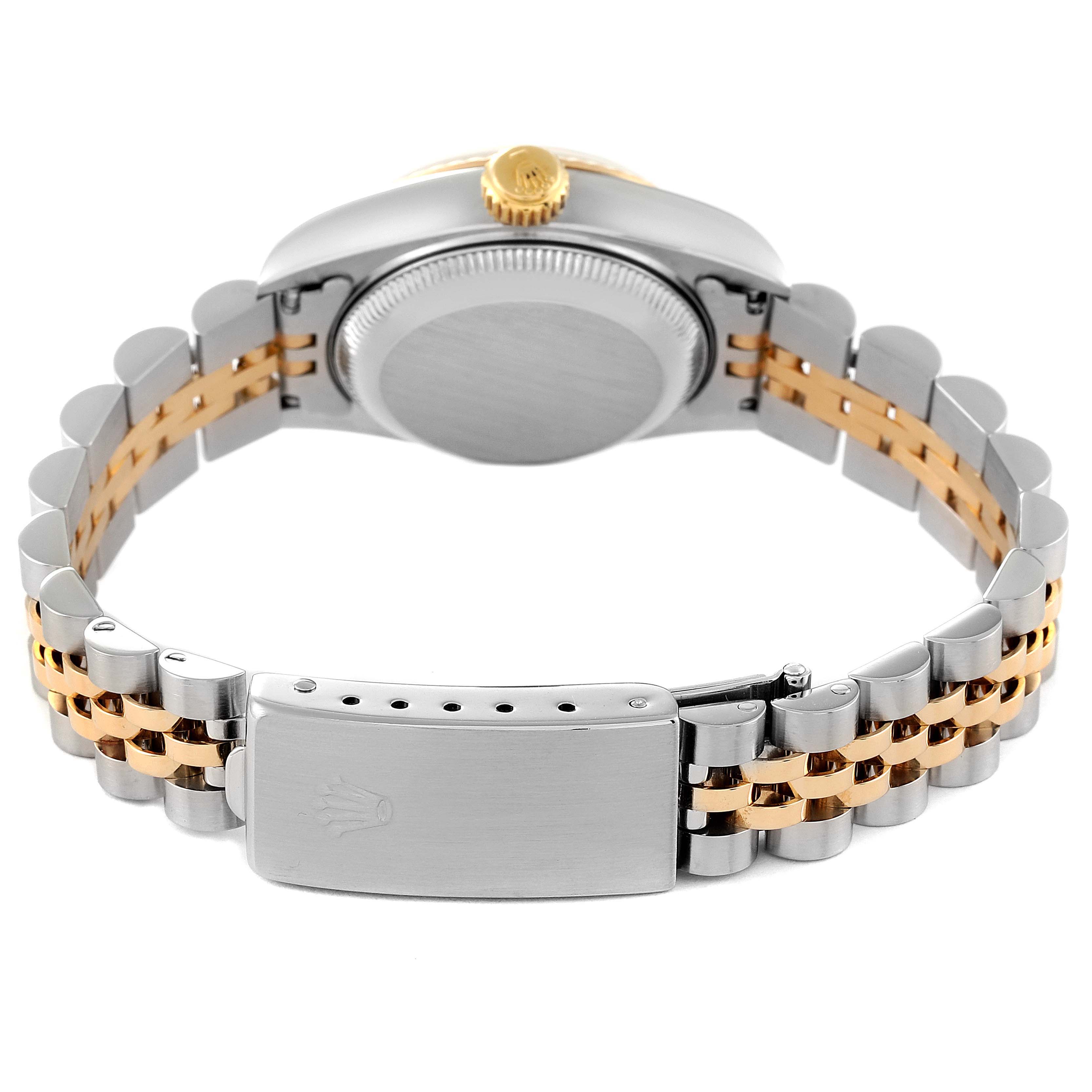 This Rolex Datejust 69173 Women's Steel and Gold (two tone) White Dial 69173 Women's Steel and Gold (two tone) White Dial watch is displayed from the back, showing the case back, crown, and two-tone bracelet with the clasp.