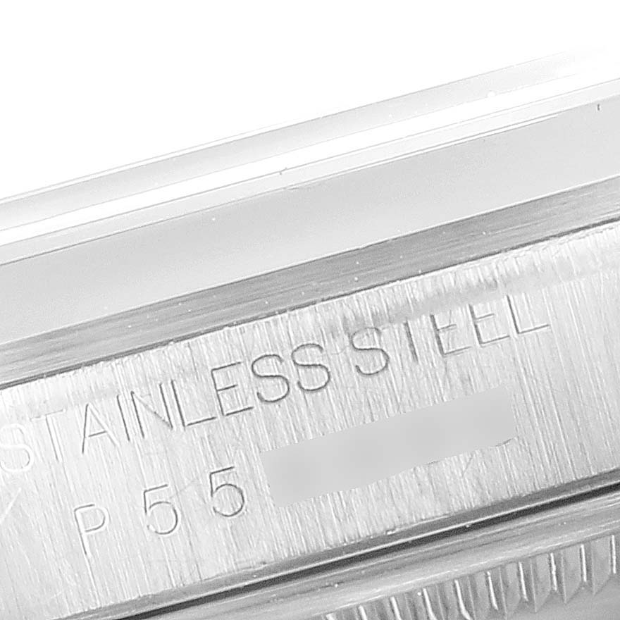 This image shows a close-up of the stainless steel case and engraving of a Rolex Datejust 16200 Men's Stainless Steel White Dial 16200 Men's Stainless Steel White Dial watch.