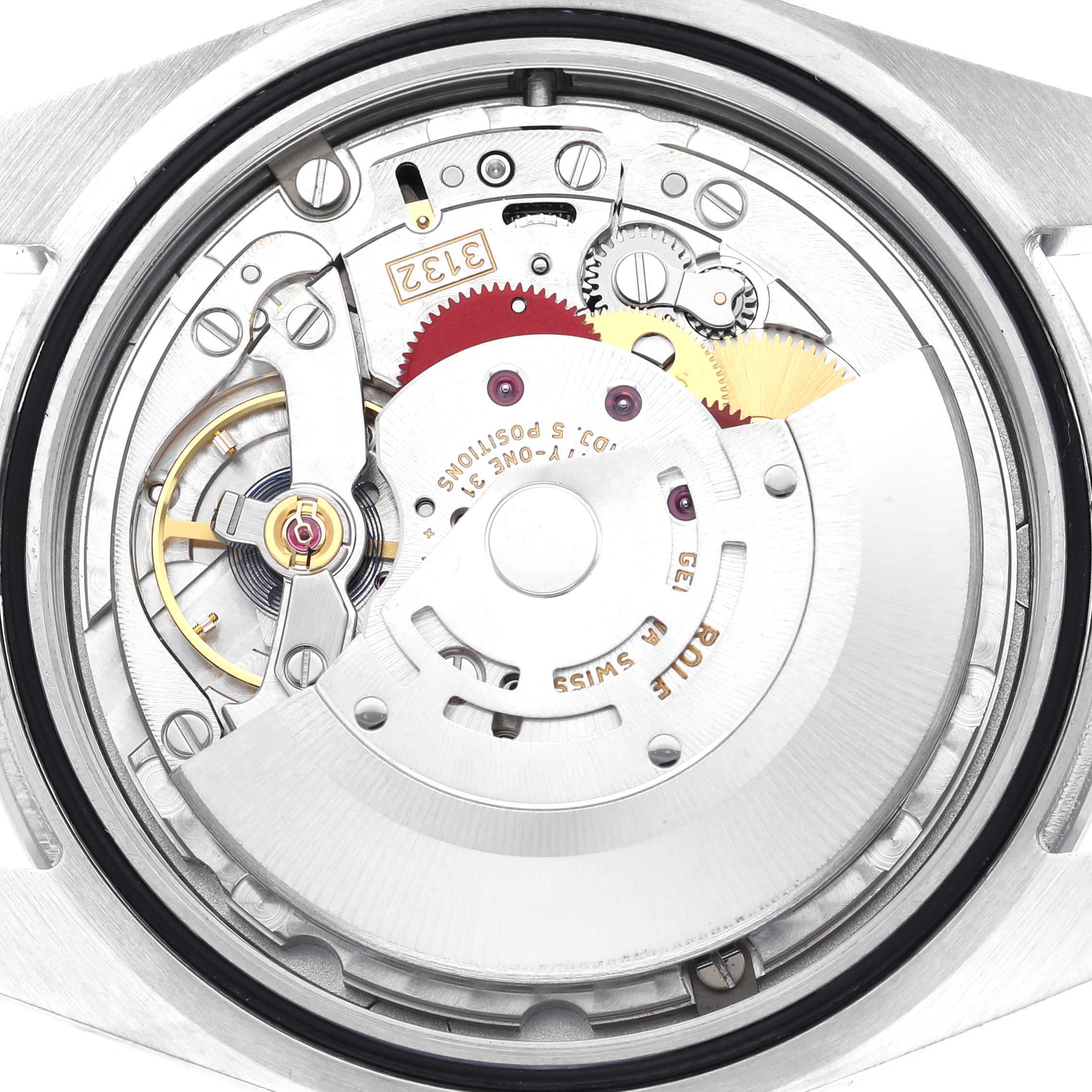 This image shows the internal mechanism of a Rolex Explorer 214270 Men's Stainless Steel Black Dial 214270 Men's Stainless Steel Black Dial watch, displaying its intricate gears and components from the back.