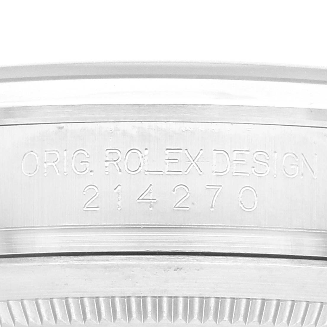 The image shows an engraving of the Rolex Explorer 214270 Men's Stainless Steel Black Dial 214270 Men's Stainless Steel Black Dial model's case with serial number 214270.