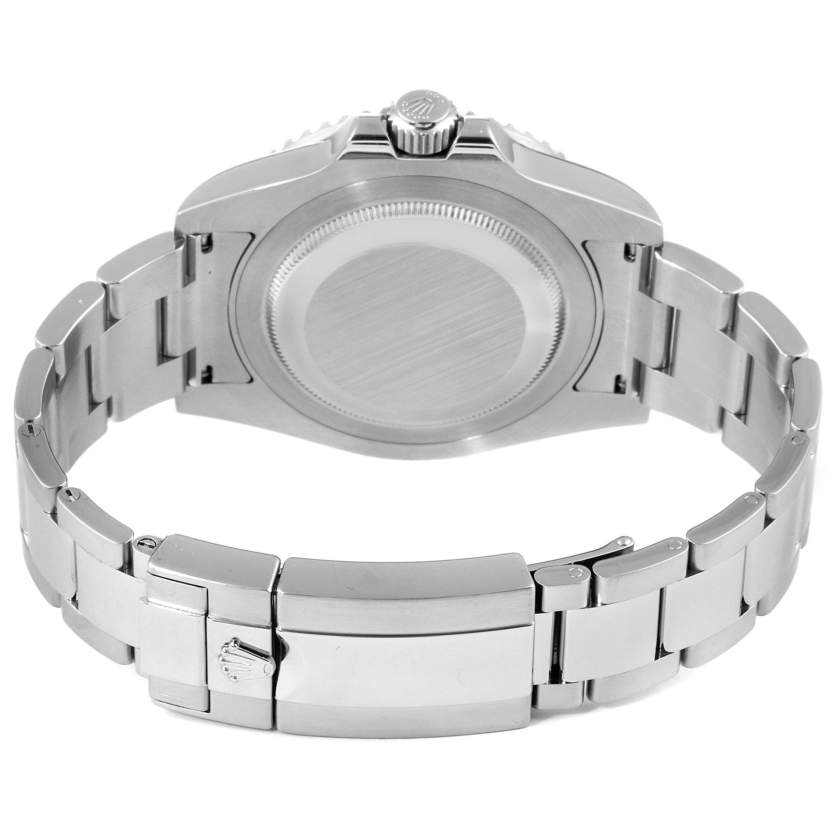 The image shows the back view of a Rolex GMT-Master 116710 Men
s Stainless Steel Black Dial 116710 Men
s Stainless Steel Black Dial watch, highlighting its case back and stainless steel bracelet.