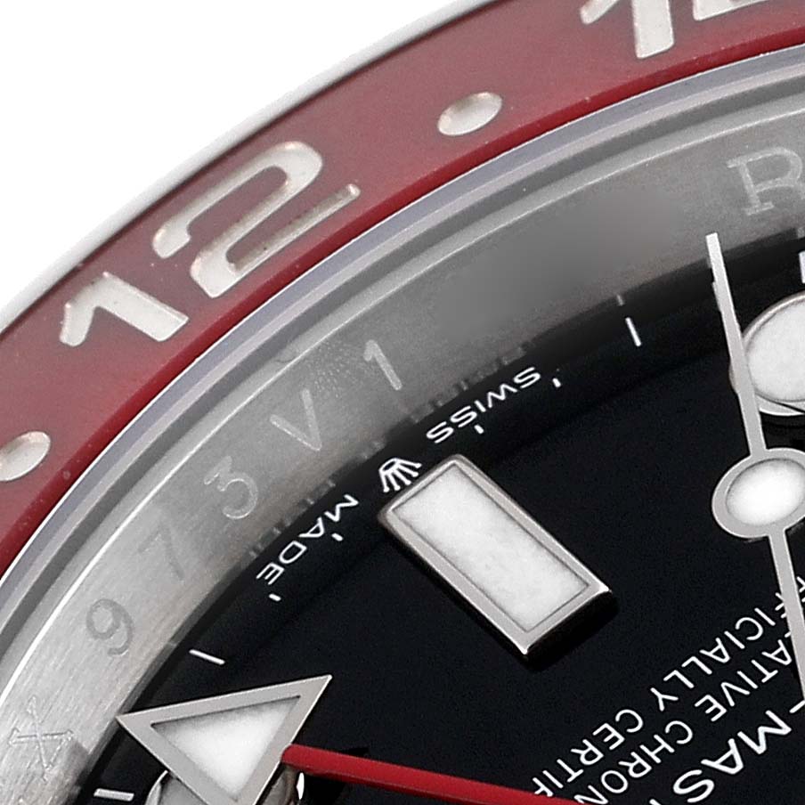 This close-up image shows the dial, bezel, and hands of the Rolex GMT-Master 126710BLRO Men
s Stainless Steel Black Dial 126710BLRO Men
s Stainless Steel Black Dial watch, highlighting the 12 o
clock marker.