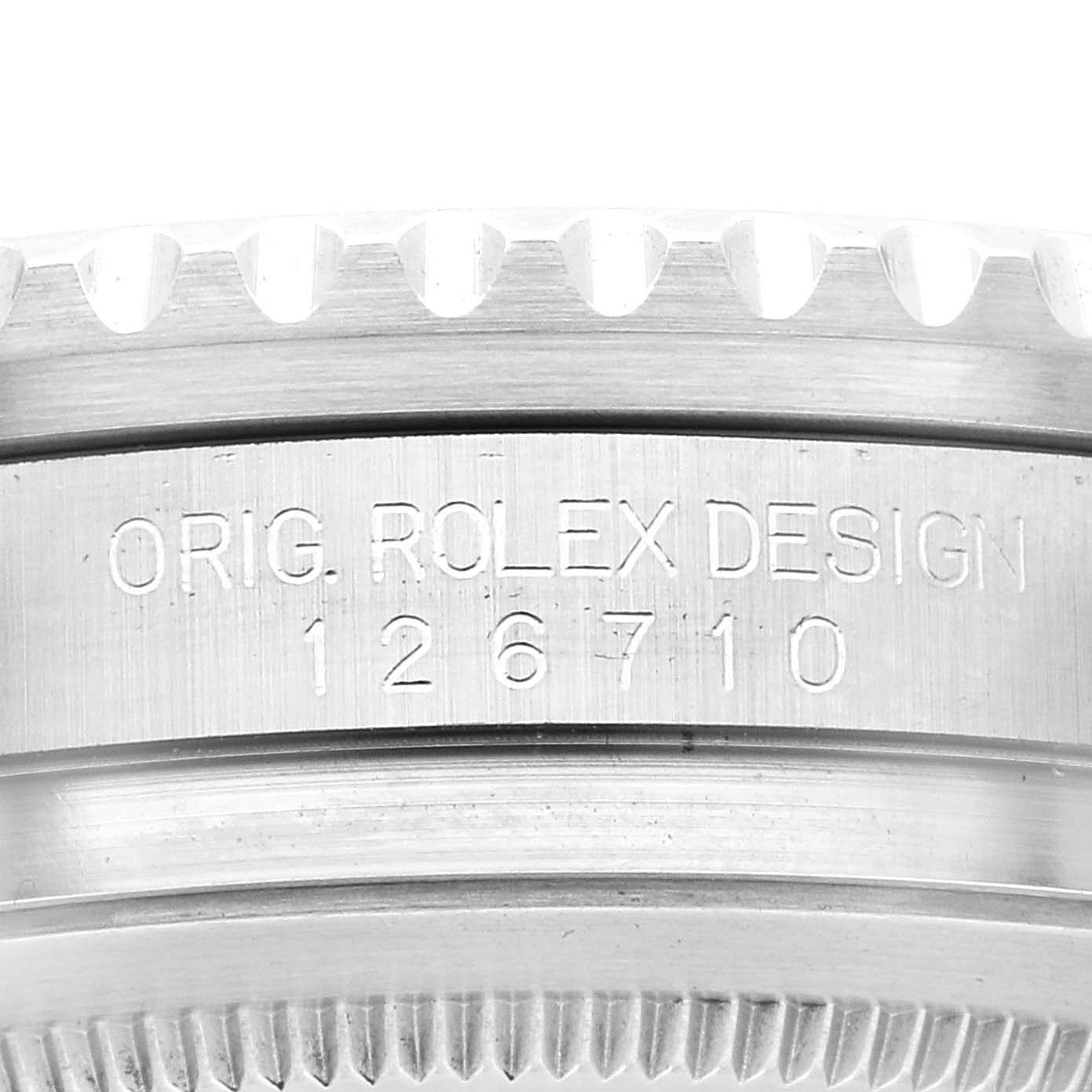 This image shows a close-up of the side engraving on the bezel of a Rolex GMT-Master 126710BLRO Men
s Stainless Steel Black Dial 126710BLRO Men
s Stainless Steel Black Dial model watch.