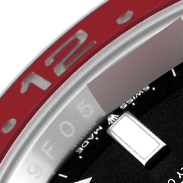The image shows a close-up of the bezel and part of the dial of a Rolex GMT-Master 126710BLRO Men's Stainless Steel Black Dial 126710BLRO Men's Stainless Steel Black Dial watch.