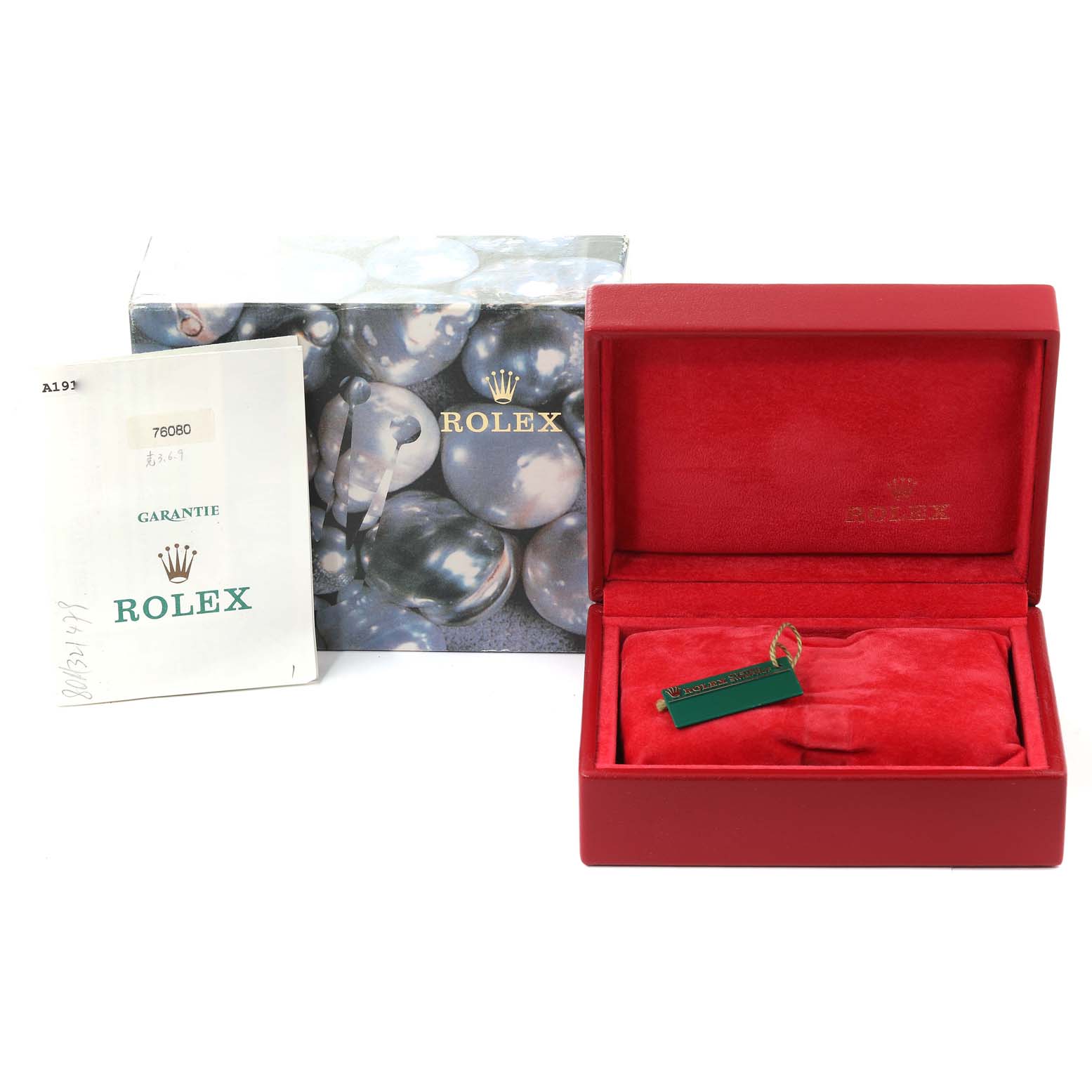 The image shows the box, warranty card, and tag for a Rolex Oyster Perpetual 76080 Women's Stainless Steel Black Dial 76080 Women's Stainless Steel Black Dial watch.
