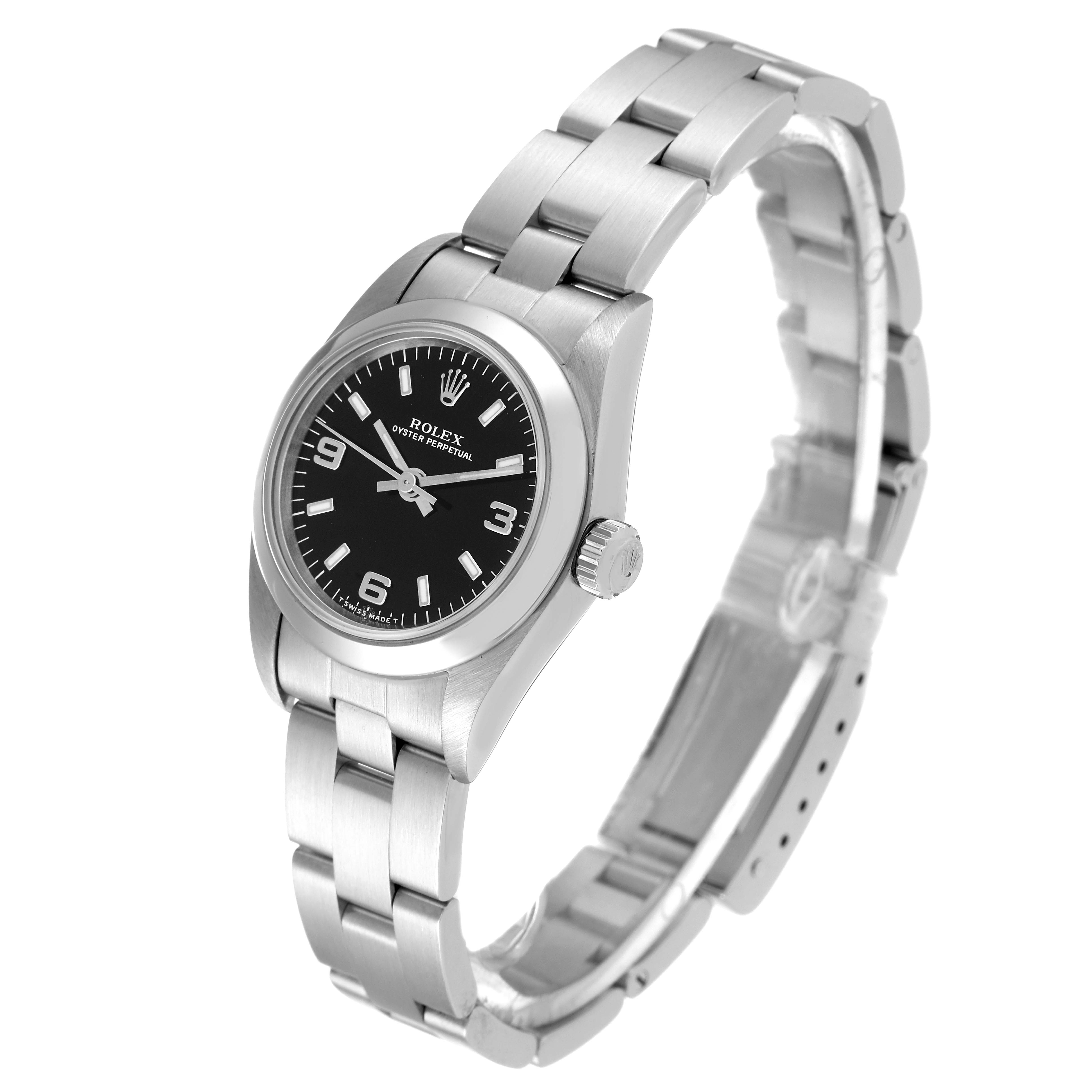The Rolex Oyster Perpetual 76080 Women's Stainless Steel Black Dial 76080 Women's Stainless Steel Black Dial watch is shown at a slight angle, showcasing its black dial, bracelet, and crown.