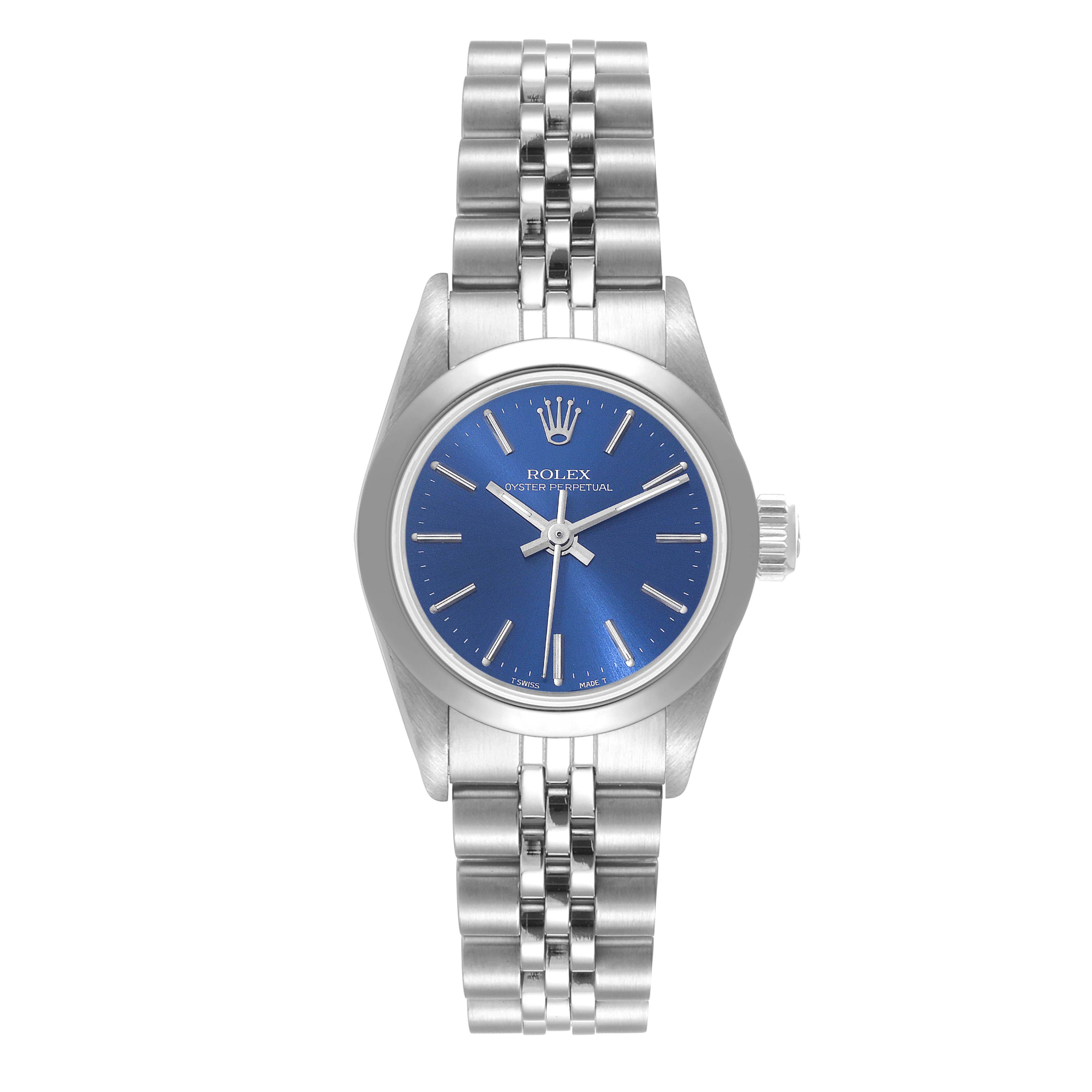 The image shows a Rolex Oyster Perpetual 67180 Women
s Stainless Steel Blue Dial 67180 Women
s Stainless Steel Blue Dial watch from a top-down angle, highlighting the blue dial, case, and bracelet.