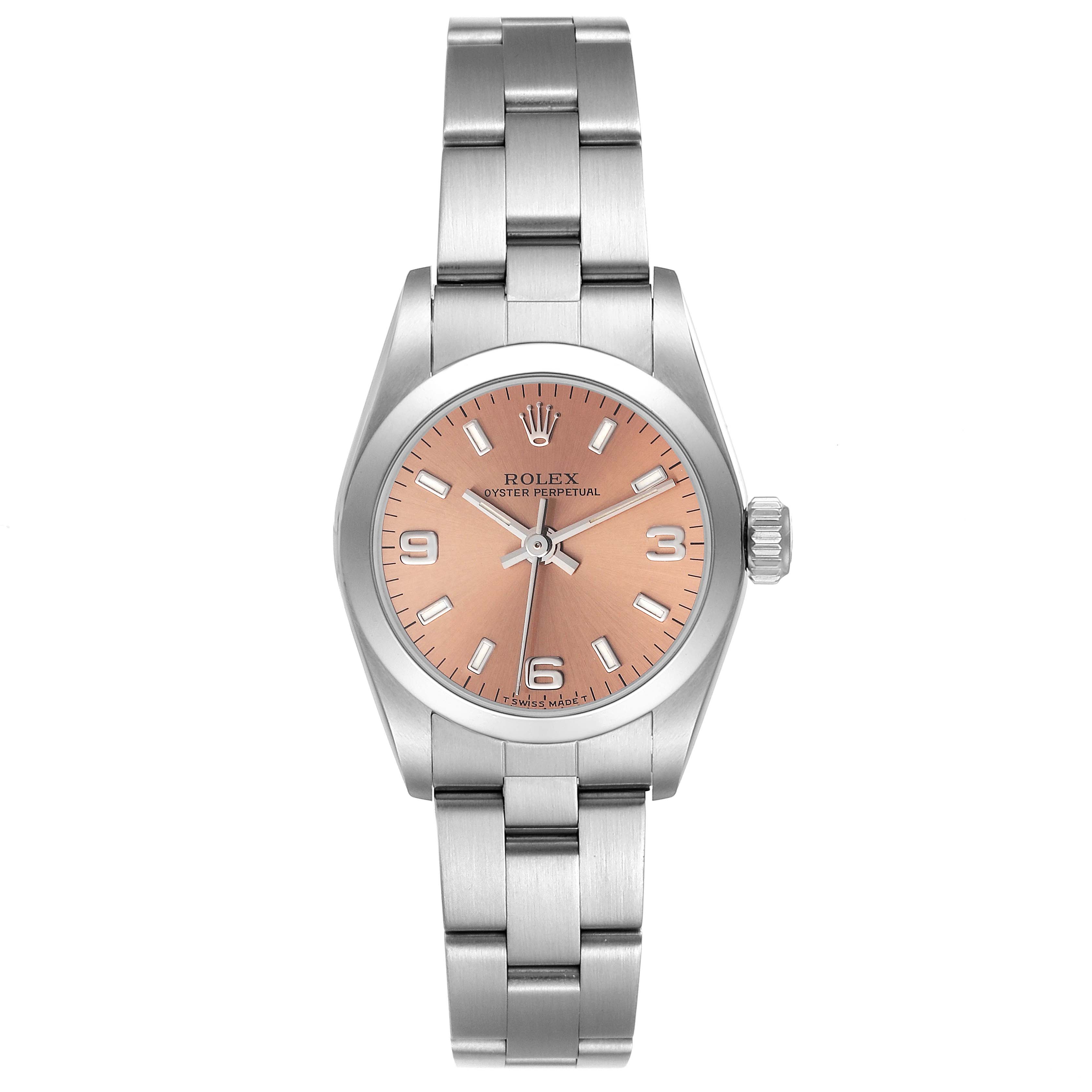 This image shows a Rolex Oyster Perpetual 67180 Women
s Stainless Steel Pink Dial 67180 Women
s Stainless Steel Pink Dial watch from a top-down angle, displaying its face, bezel, and bracelet.