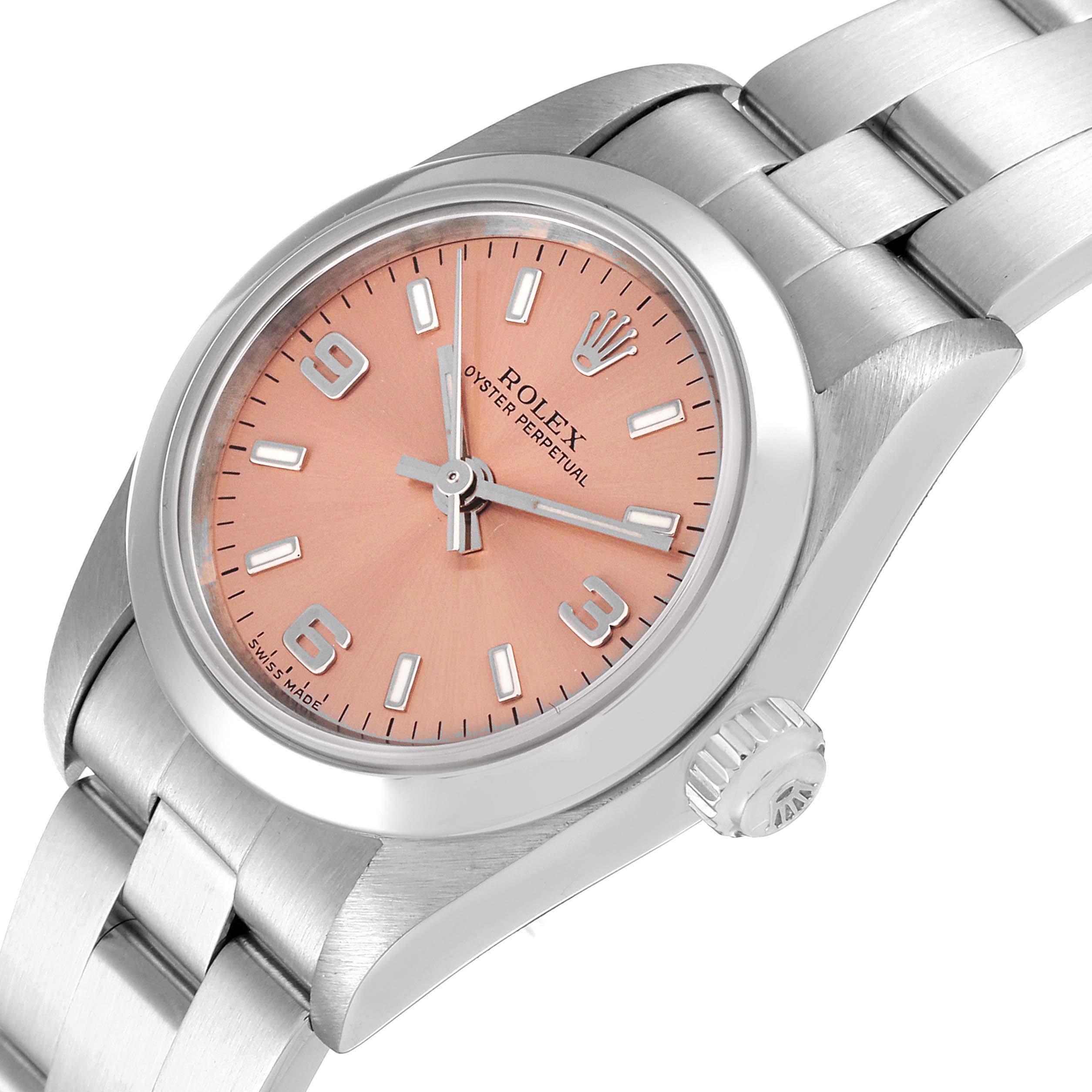 This image shows a Rolex Oyster Perpetual 76080 Women
s Stainless Steel Pink Dial 76080 Women
s Stainless Steel Pink Dial watch at an angled close-up, highlighting its dial, case, bezels, bracelet, and crown.