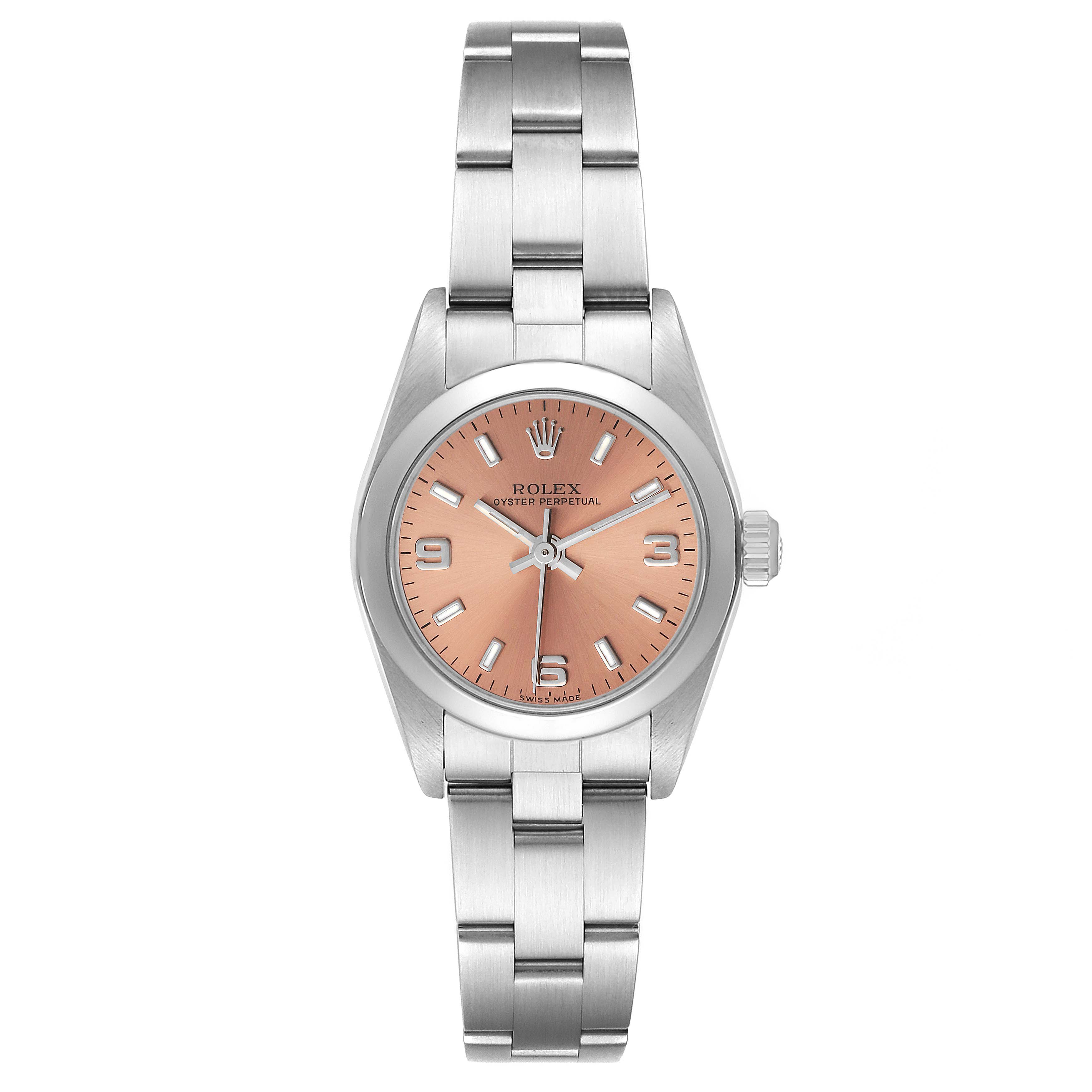 This image shows a front view of a Rolex Oyster Perpetual 76080 Women
s Stainless Steel Pink Dial 76080 Women
s Stainless Steel Pink Dial watch with a salmon-pink dial and stainless steel bracelet.