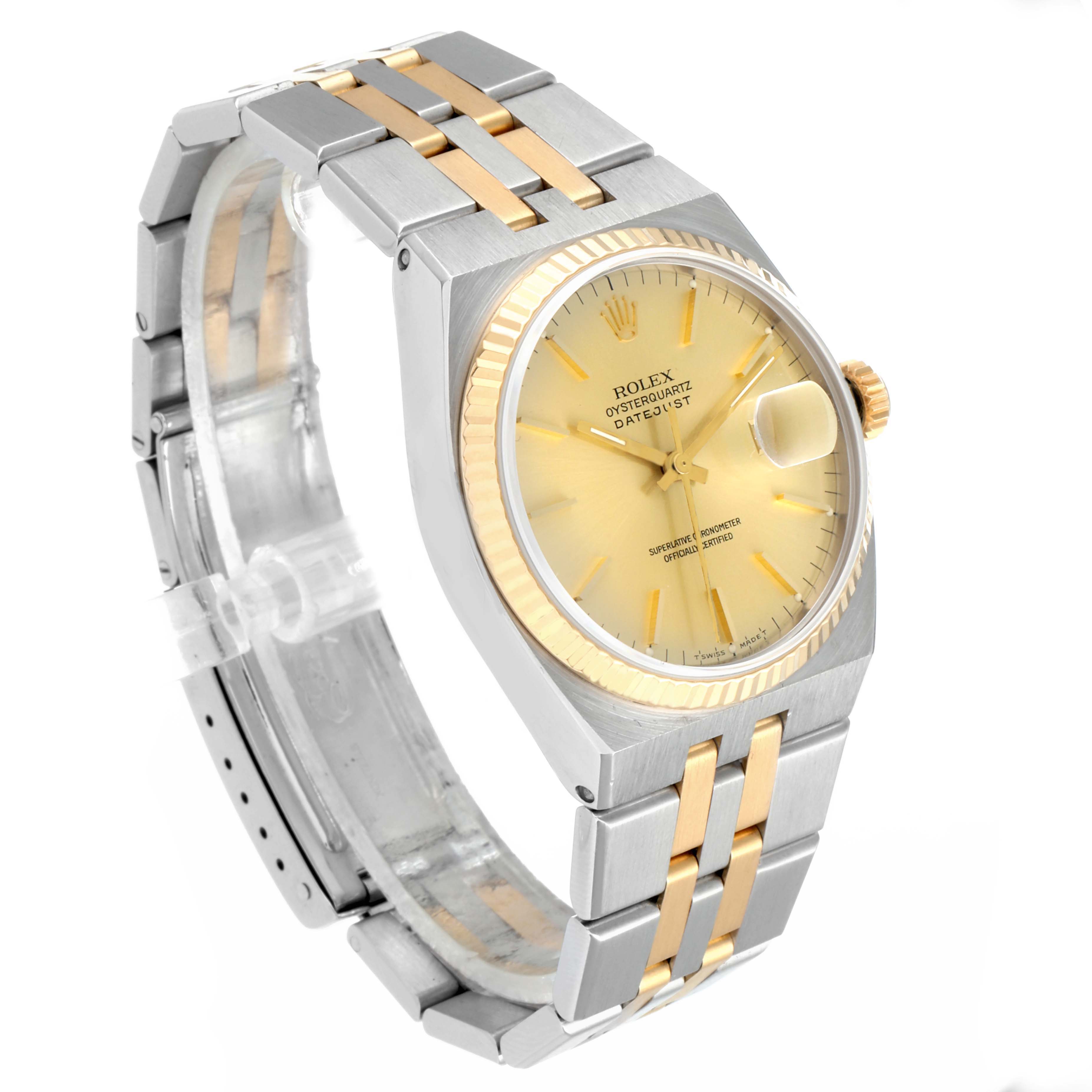 This Rolex Oysterquartz 17013 Men's Steel and Gold (two tone) Champagne Dial 17013 Men's Steel and Gold (two tone) Champagne Dial watch is shown at a slight angle, highlighting the face, crown, and two-tone bracelet.