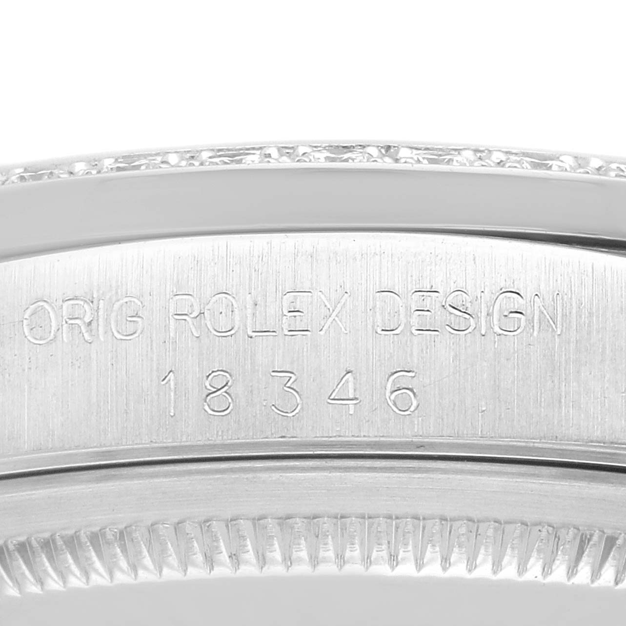 The image shows a close-up of the serial number and engraving on the back of a Rolex President 18346 Men's Platinum Silver Dial 18346 Men's Platinum Silver Dial model watch.