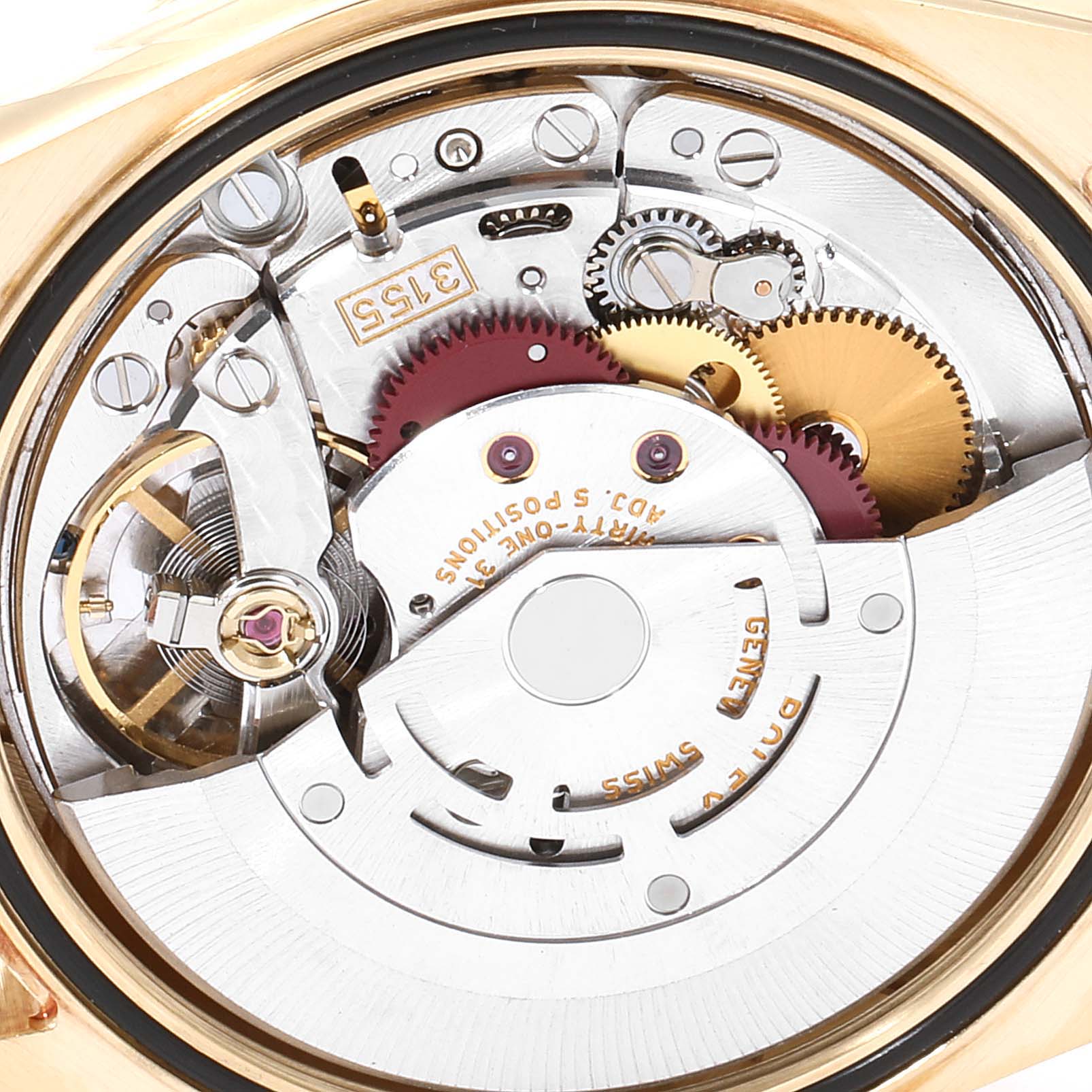 The image shows the intricate internal mechanism of the Rolex President 118238 Men
s Yellow Gold Champagne Dial 118238 Men
s Yellow Gold Champagne Dial model watch from a close-up angle.