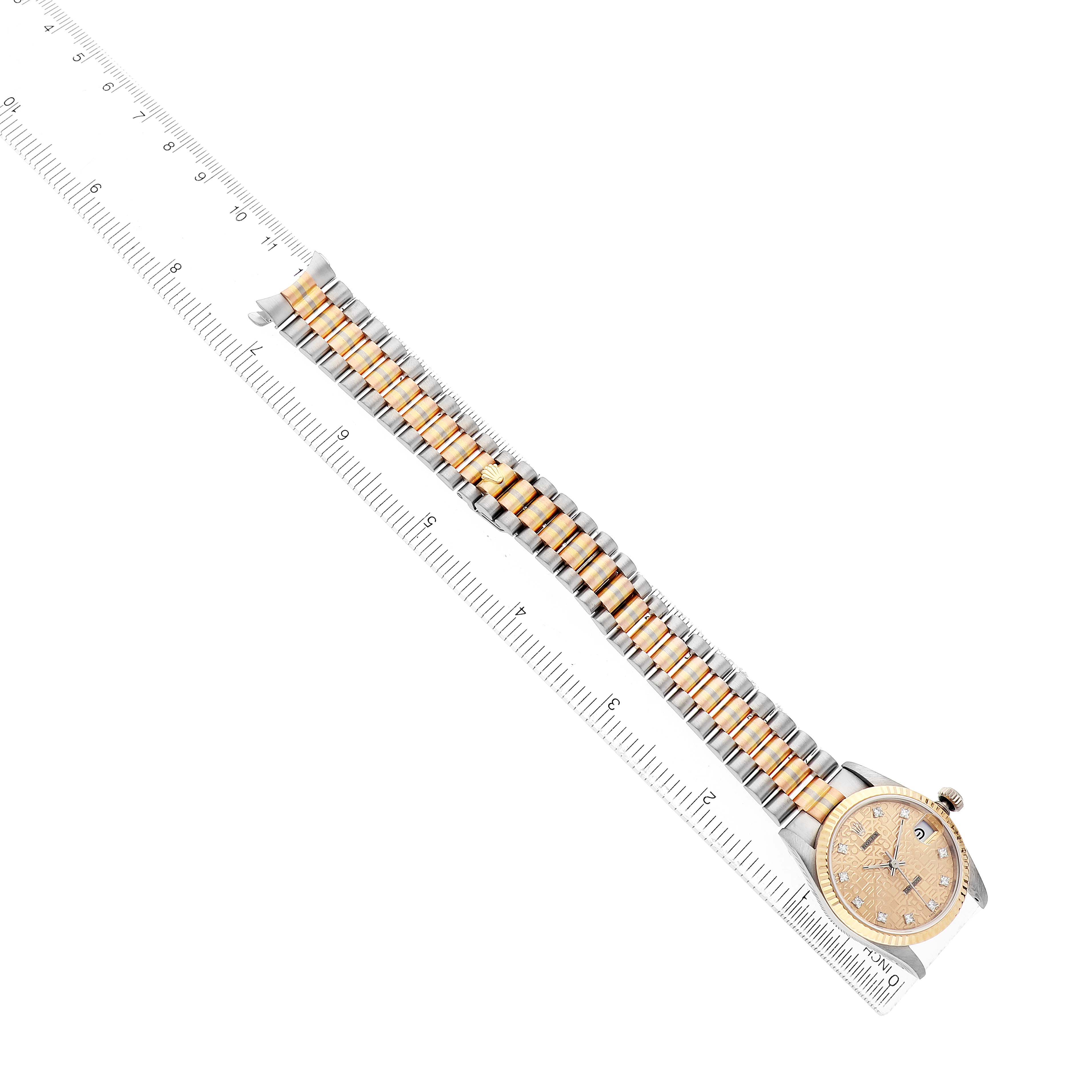 The Rolex President 68279 Women's White Gold Brown Dial model watch is shown from a top angle, featuring the face and full band length alongside a ruler.