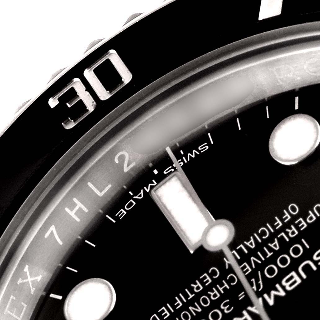 This close-up angle shows the 30-minute marker on the bezel and part of the dial and minute hand of the Rolex Submariner 116610LN Men's Stainless Steel Black Dial 116610LN Men's Stainless Steel Black Dial.