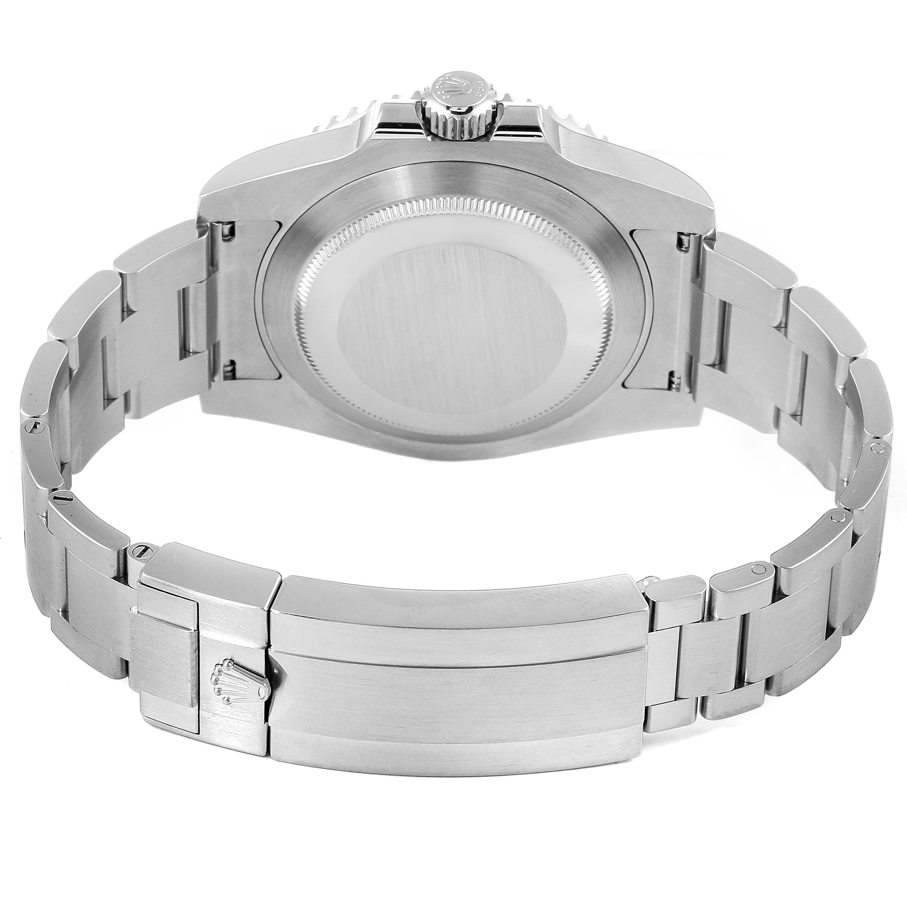 The image shows the back view of a Rolex Submariner 116610LN Men
s Stainless Steel Black Dial 116610LN Men
s Stainless Steel Black Dial watch, highlighting its case back and metal bracelet.