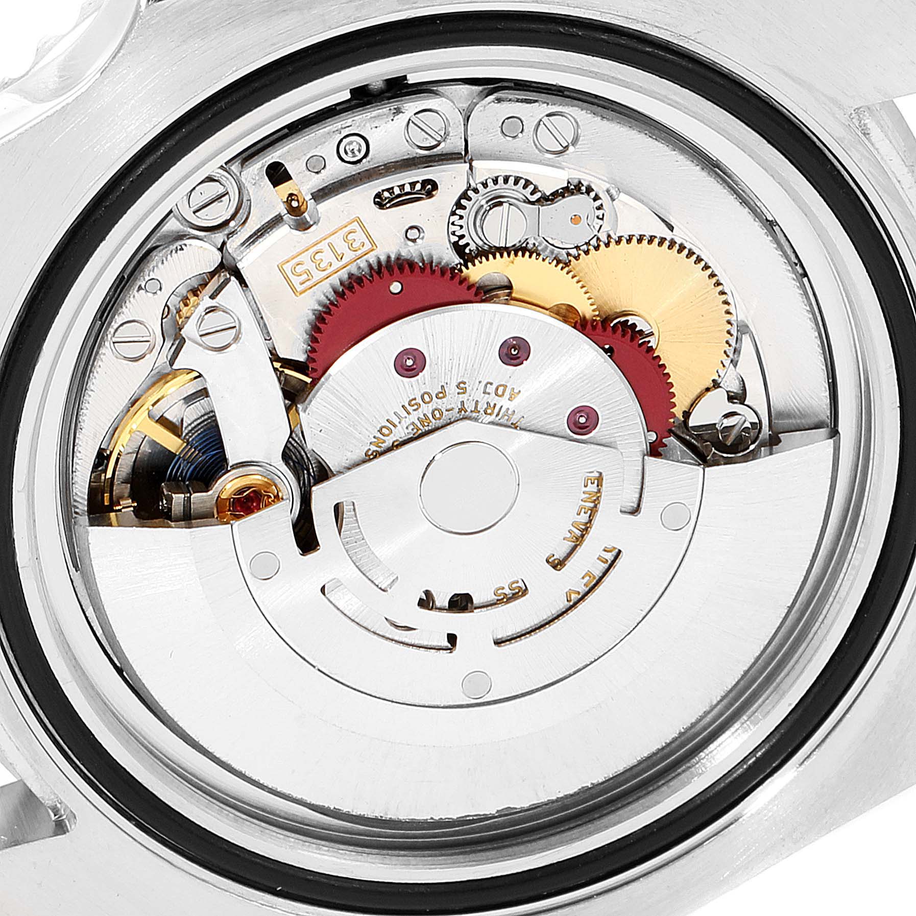 The image shows the inner mechanical movement of a Rolex Submariner 116610LN Men
s Stainless Steel Black Dial 116610LN Men
s Stainless Steel Black Dial watch from a back view.