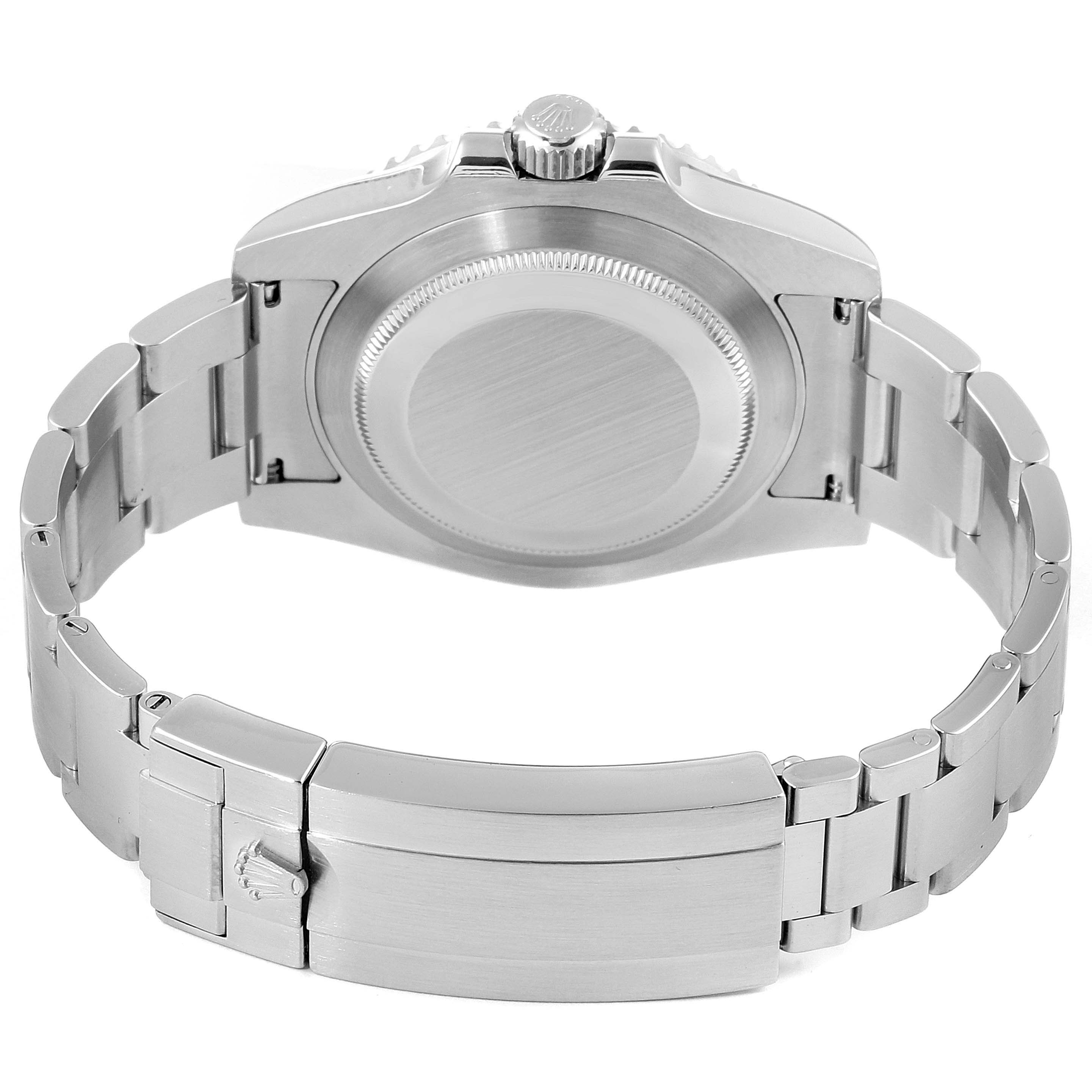 The image shows the back side of a Rolex Submariner 116610LN Men
s Stainless Steel Black Dial 116610LN Men
s Stainless Steel Black Dial watch, highlighting its case back, bracelet, and clasp.