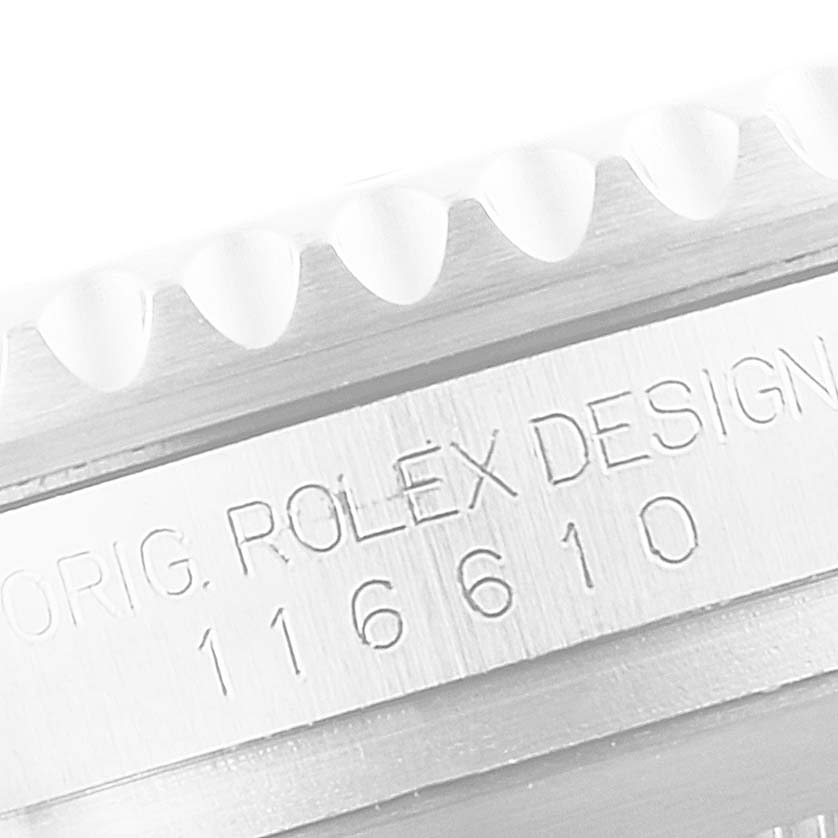 This image shows a close-up of the bezel and case side of a Rolex Submariner 116610LN Men
s Stainless Steel Black Dial 116610LN Men
s Stainless Steel Black Dial, displaying part of the model number and "ROLEX DESIGN" engraving.