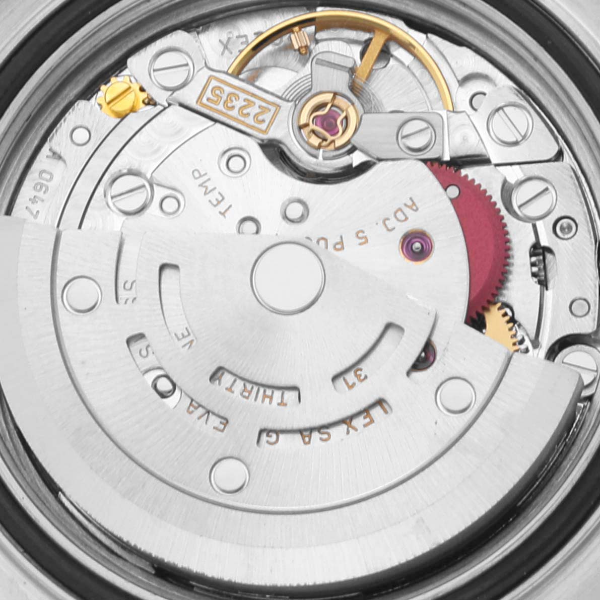 This image shows a close-up view of the movement inside a Rolex Yacht-Master 169623 Women's Steel and Gold (two tone) White Dial 169623 Women's Steel and Gold (two tone) White Dial watch.