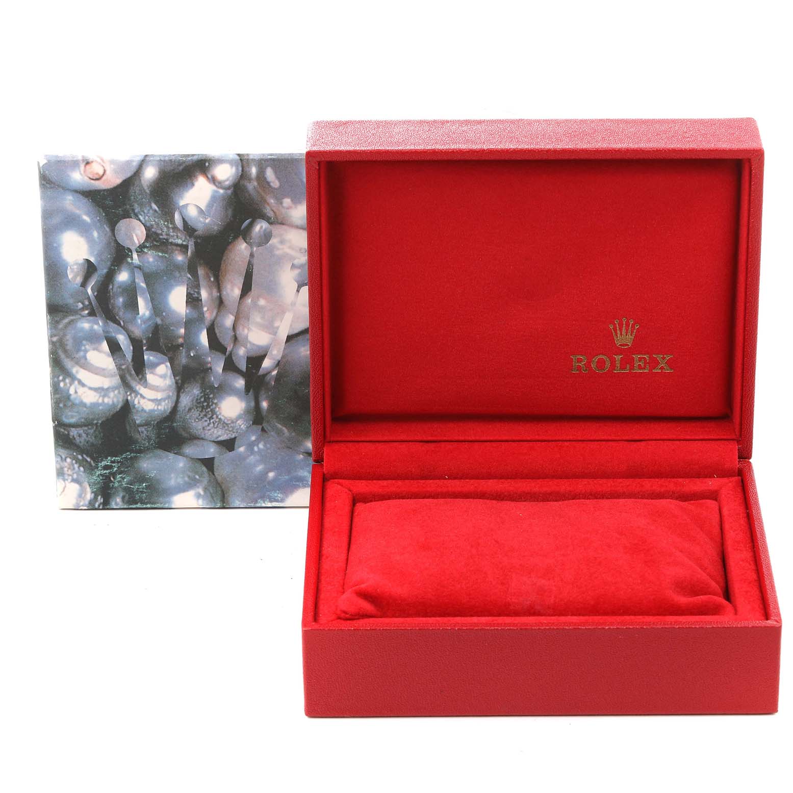 The image shows an open red Rolex watch box for the Yacht-Master model, featuring Rolex branding and a cushion inside.