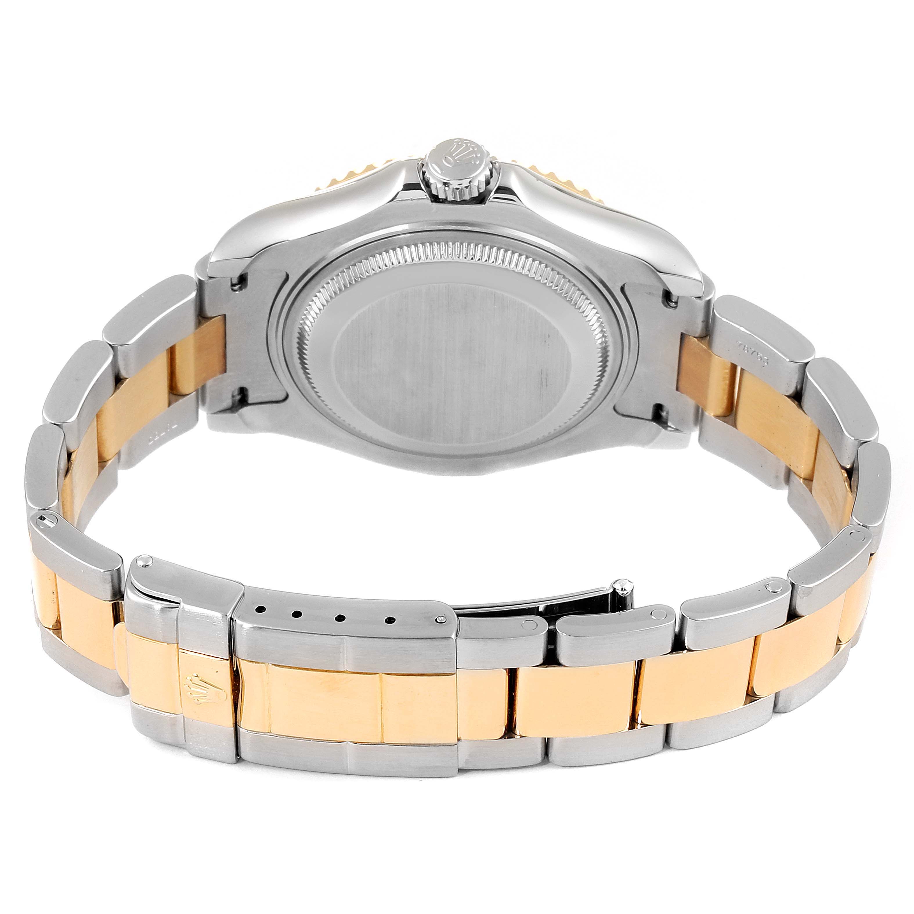 The image shows the back view of a Rolex Yacht-Master 68623 Men
s Steel and Gold (two tone) Grey Dial 68623 Men
s Steel and Gold (two tone) Grey Dial watch, highlighting its case back and two-tone bracelet.