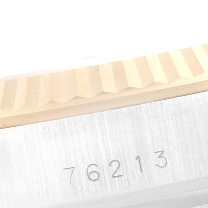 This image shows a close-up of the fluted bezel and part of the case with the model number of the Tudor Prince 76213 Men's Steel and Gold (two tone) Champagne Dial 76213 Men's Steel and Gold (two tone) Champagne Dial watch.