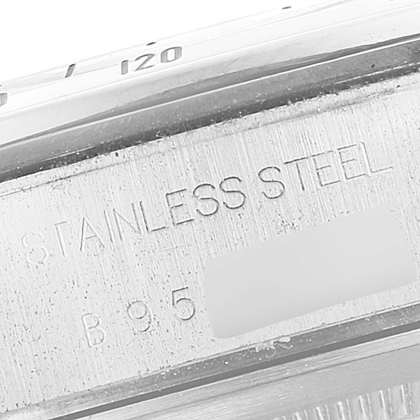 This close-up image of the Tudor Prince model watch shows the stainless steel band with engraved text.