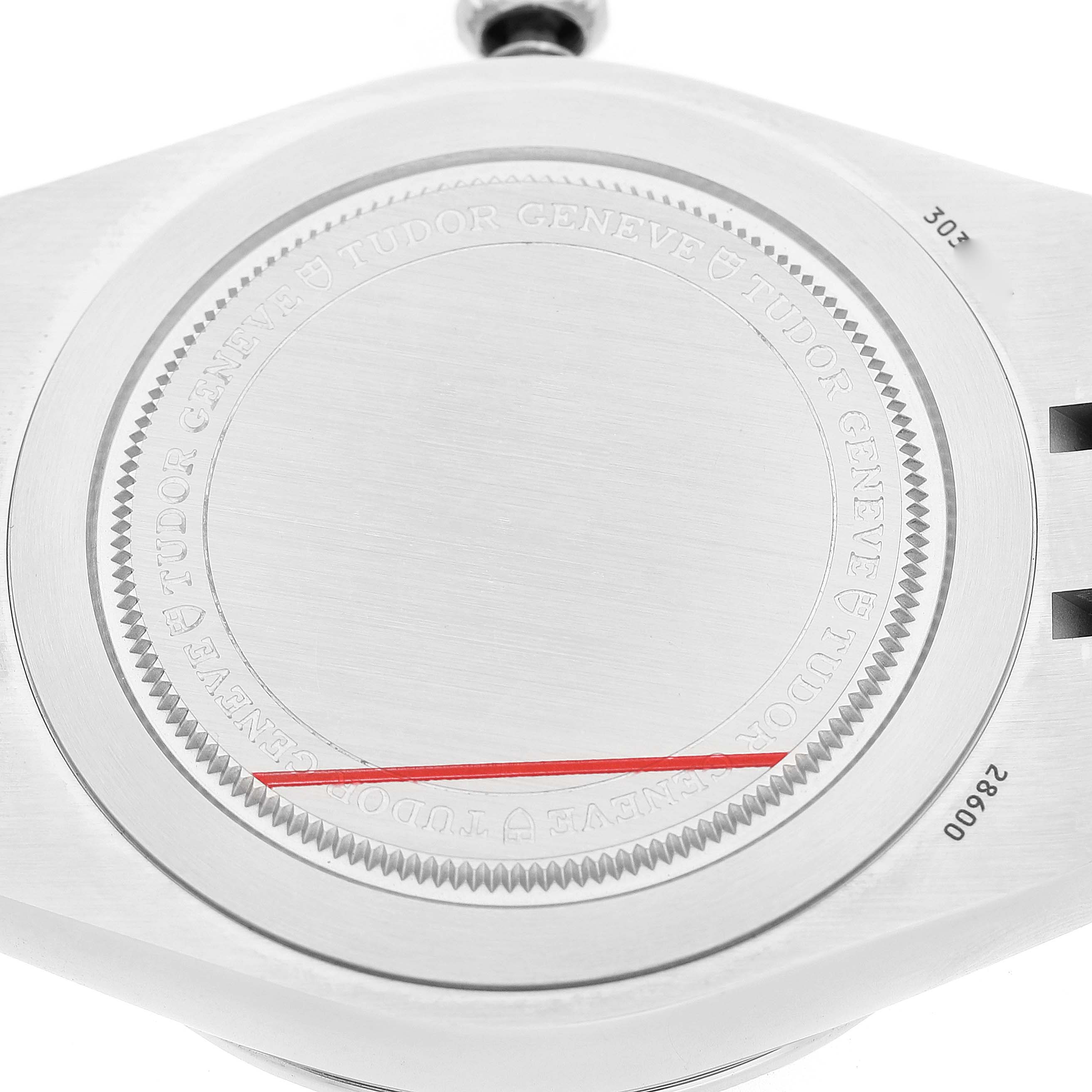 The image shows the back of a Tudor Royal 28600 Men's Stainless Steel Blue Dial watch with engraved branding details.