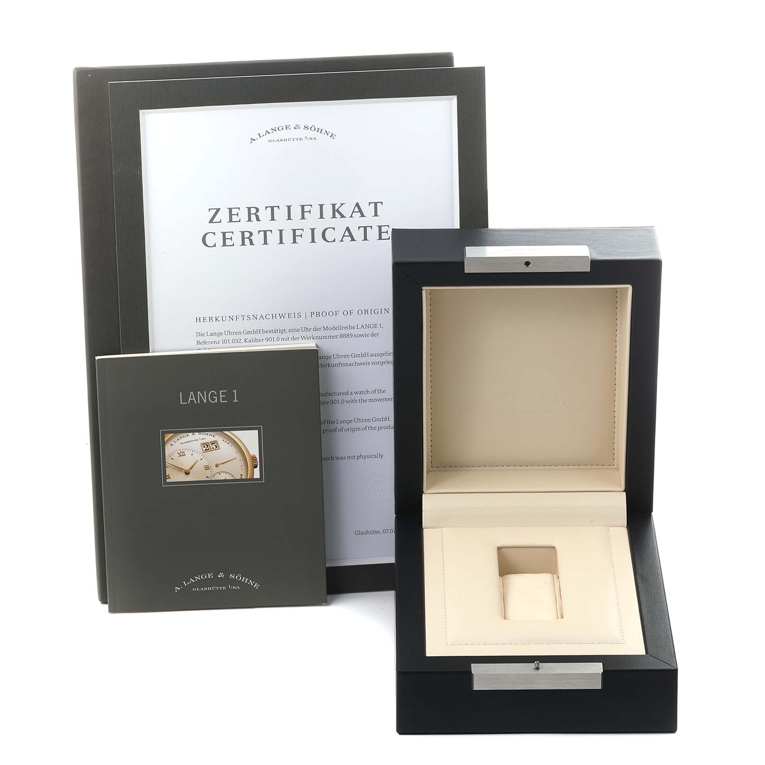 The image shows an open A. Lange & Sohne Lange 1 101.032 Men's Rose Gold Silver Dial watch box, certificate, and booklet at an angle displaying the interior.