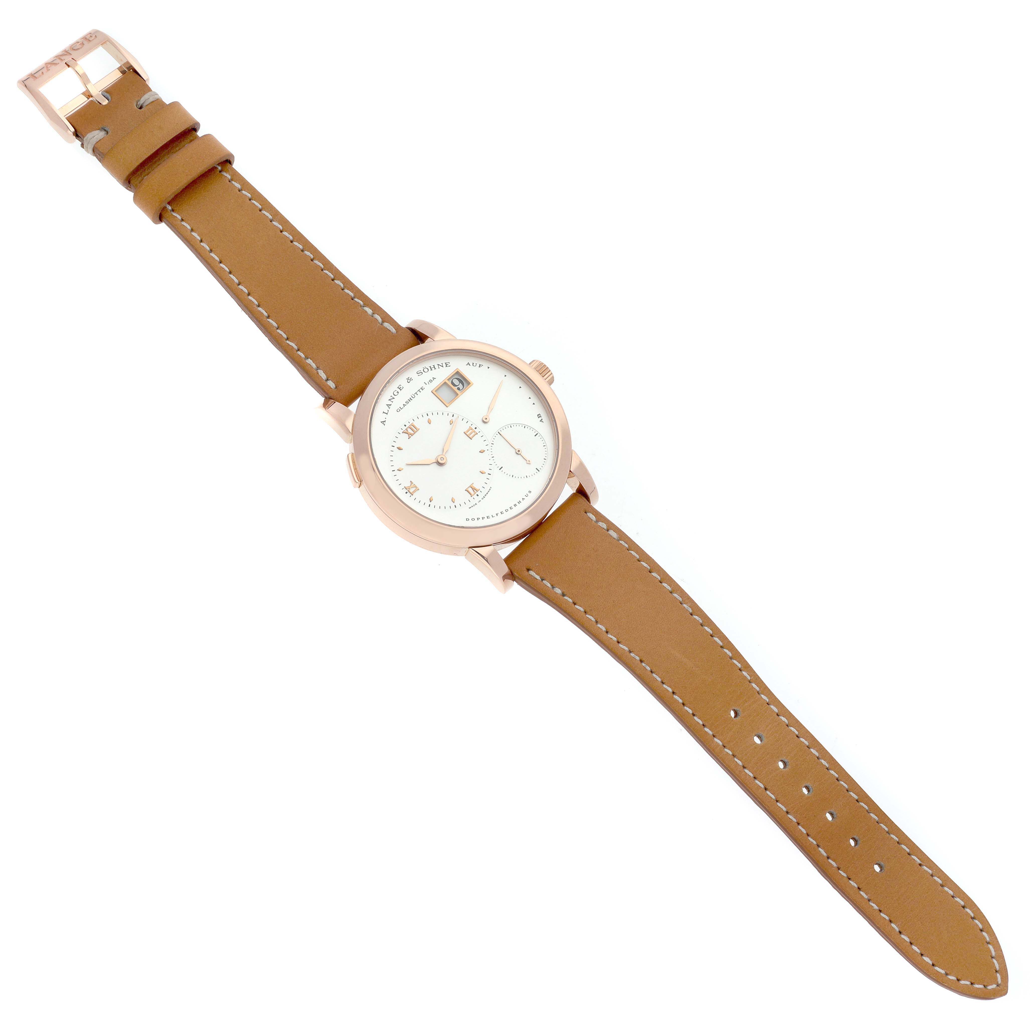 The A. Lange & Sohne Lange 1 101.032 Men's Rose Gold Silver Dial watch is shown from above, displaying the dial, case, and full leather strap.